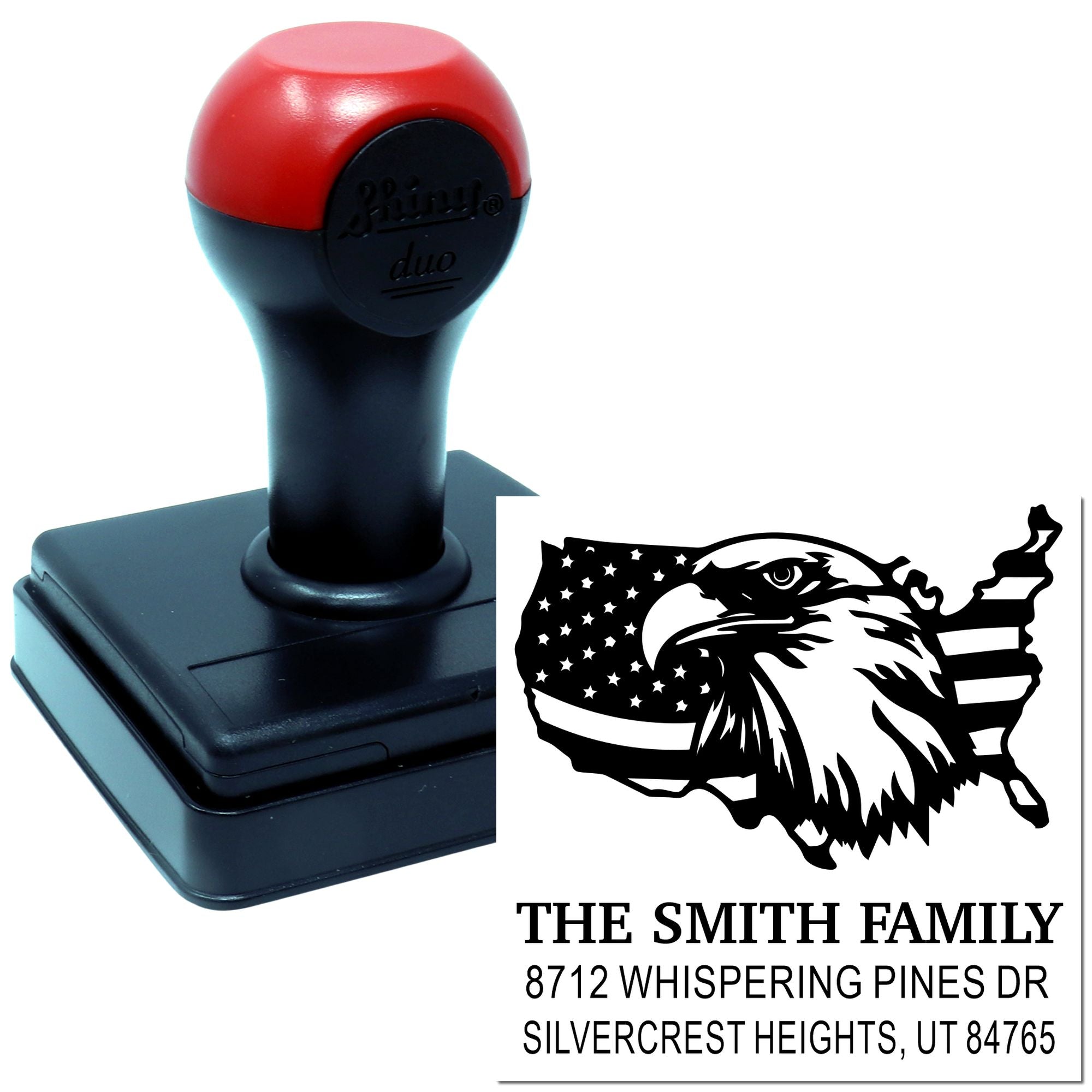 Personalized self-inking address stamp with eagle and U.S. flag design, showing The Smith Family name and Utah address imprint on white background.