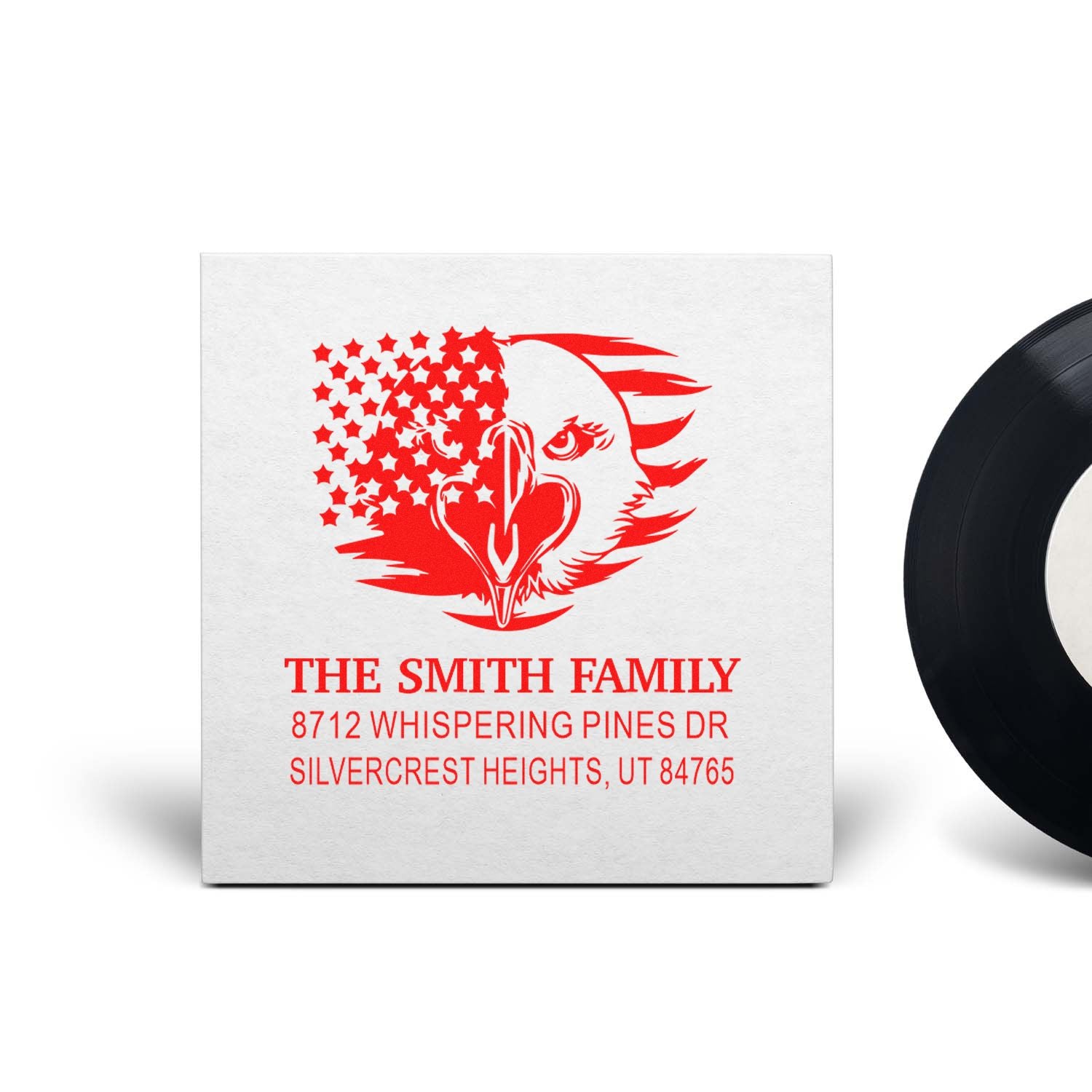 Custom address stamp with red eagle and stars design, showing The Smith Family return address on a white stamp pad.