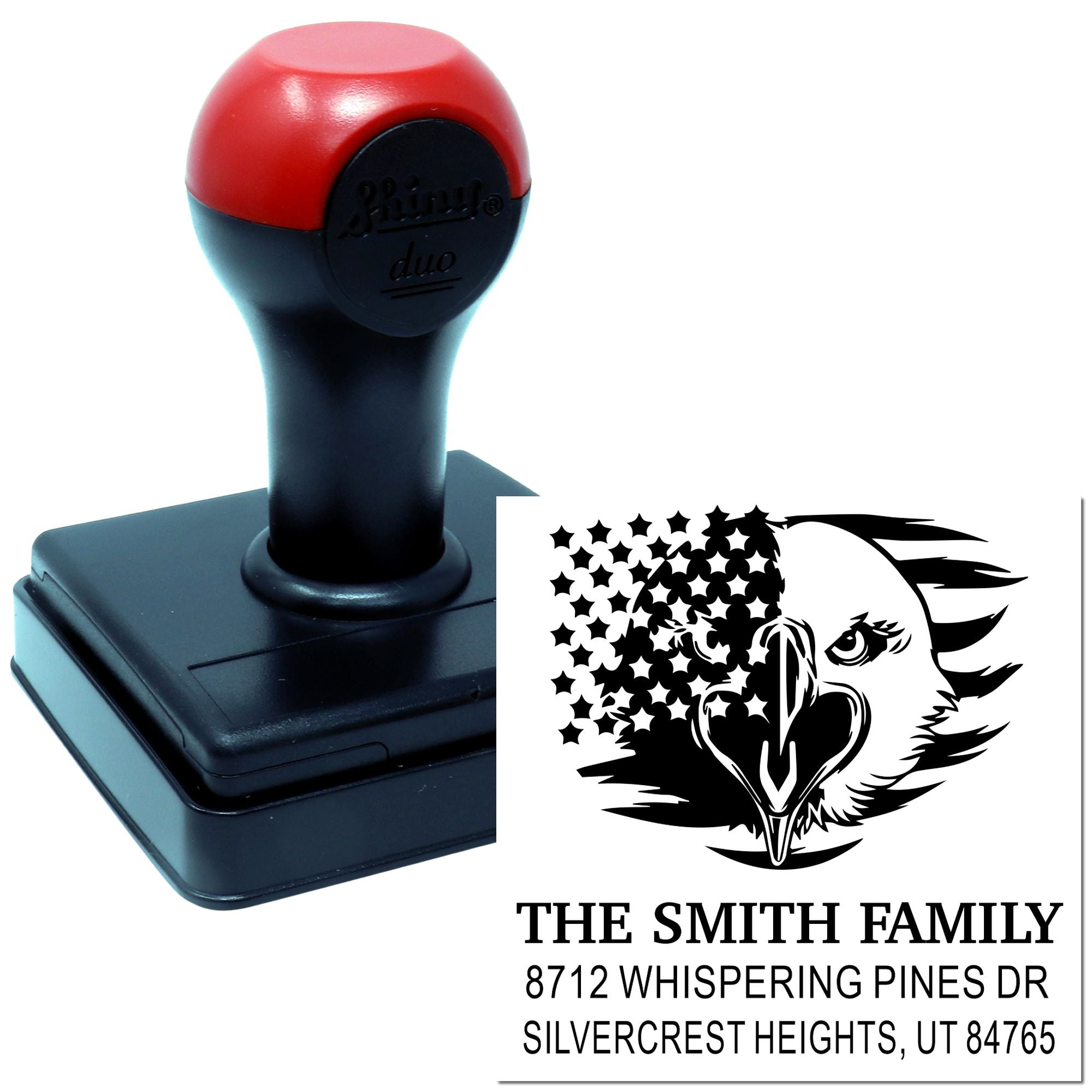 Custom self-inking address stamp with red-and-black handle, bird graphic, and The Smith Family name and address on a white background.
