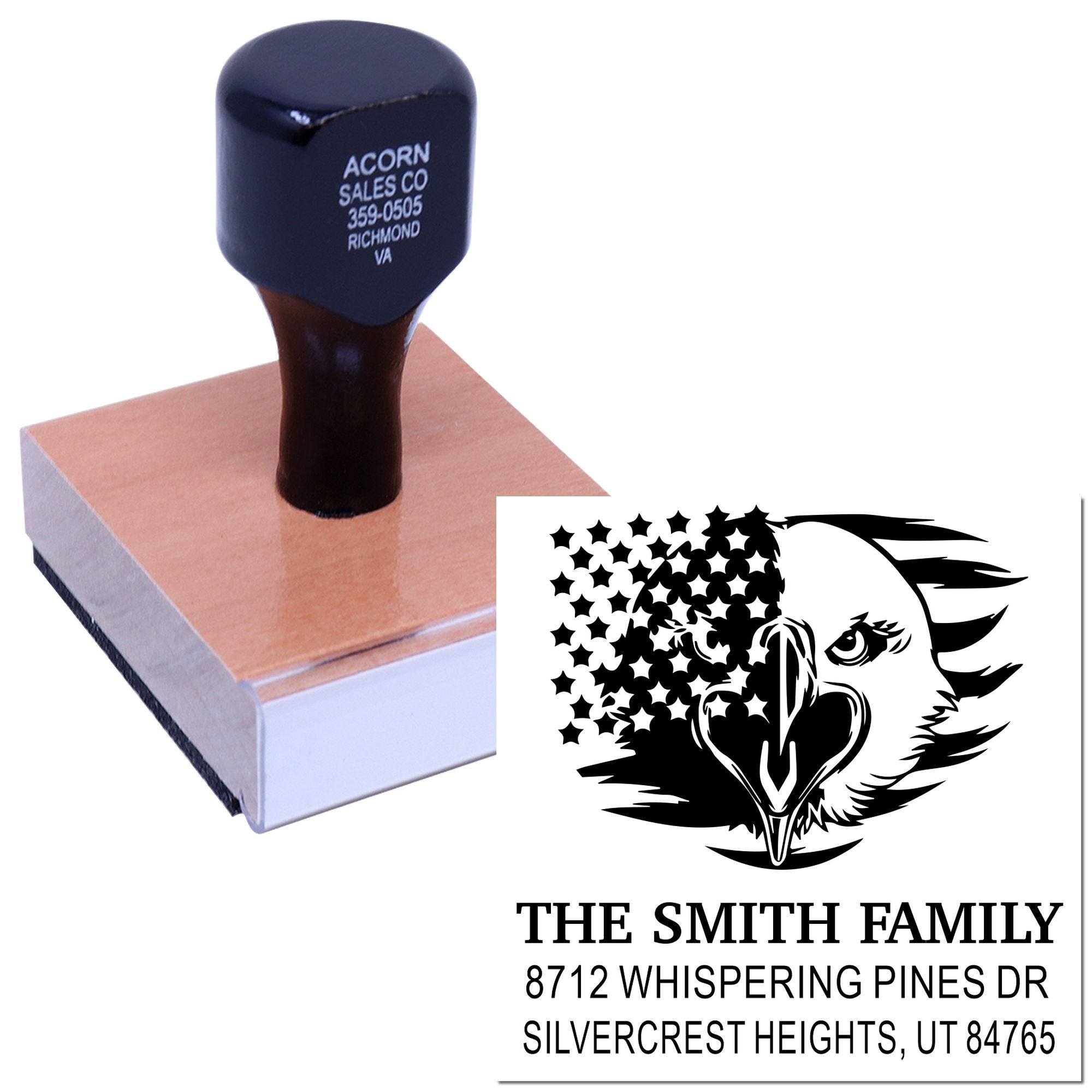 Custom rubber address stamp featuring eagle graphic and The Smith Family address on a wooden stamp block, isolated on white.