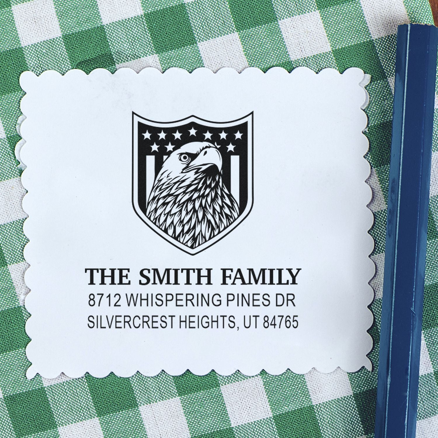 Personalized Smith Family return address rubber stamp with eagle shield emblem, scalloped border, and custom mailing address for envelopes.