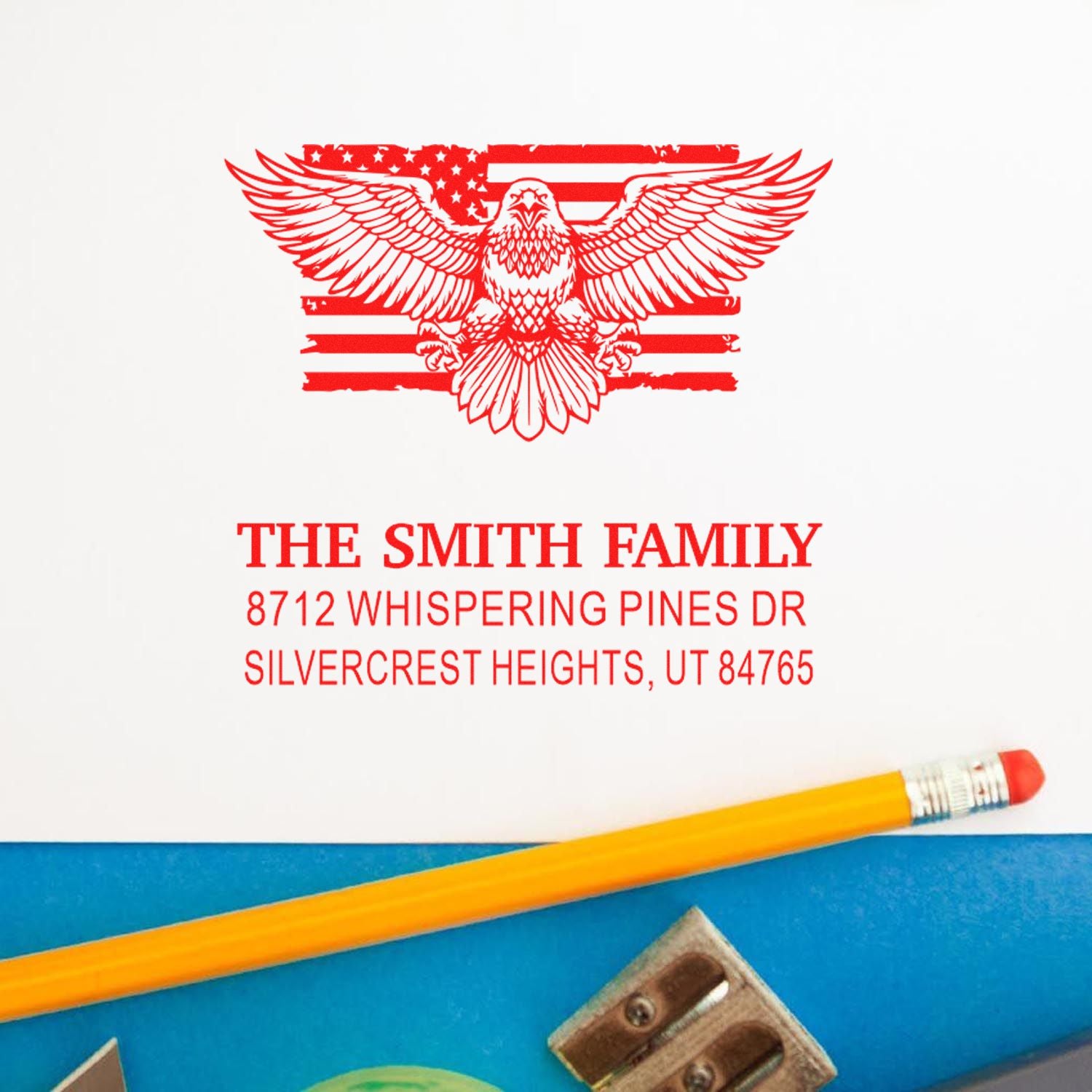 Custom return address rubber stamp with patriotic eagle and American flag design, featuring The Smith Family name and Silvercrest Heights address.