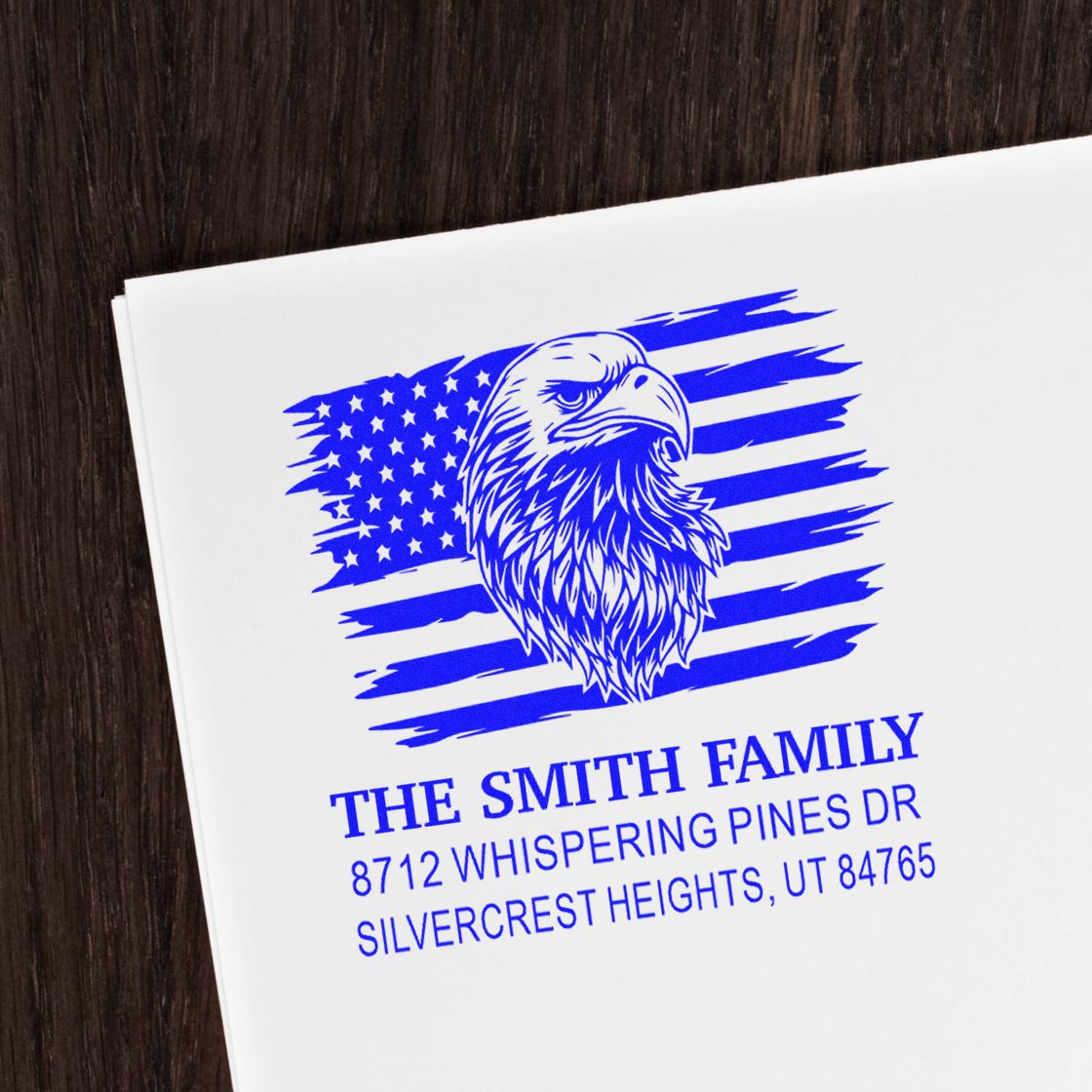 Custom eagle and American flag return address rubber stamp for family mail, featuring bold blue personalized name, street address and ZIP code.