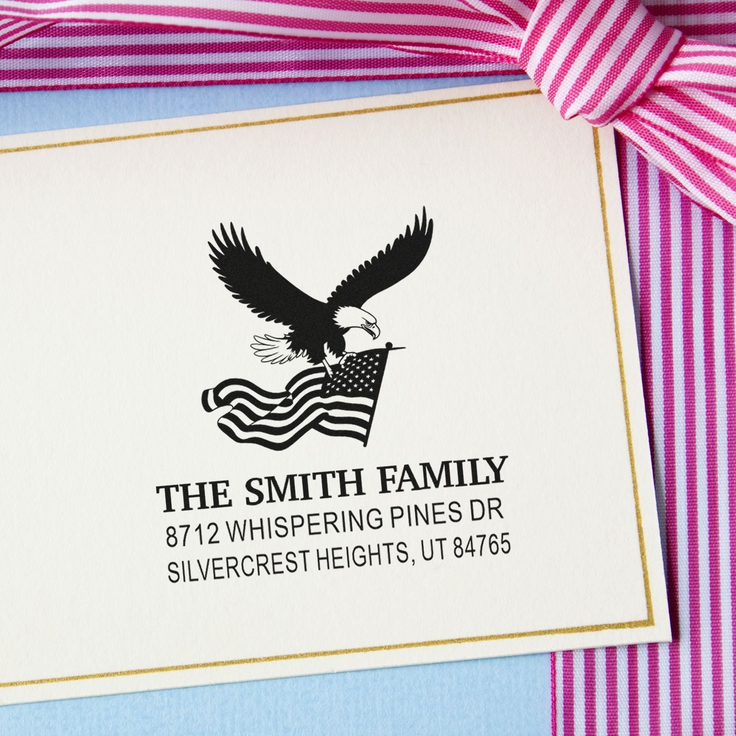 Custom return address rubber stamp with eagle and American flag design, personalized family name and address for envelopes, invitations, and stationery
