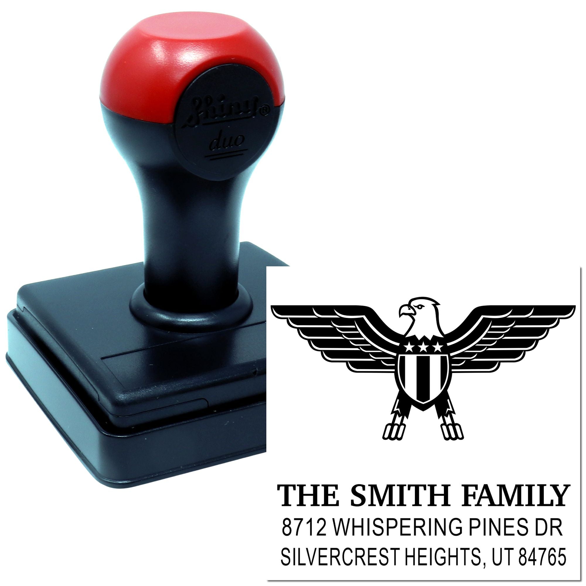Custom self-inking rubber stamp with eagle emblem, family name, and return address, ideal for personalized mailing and home office use.