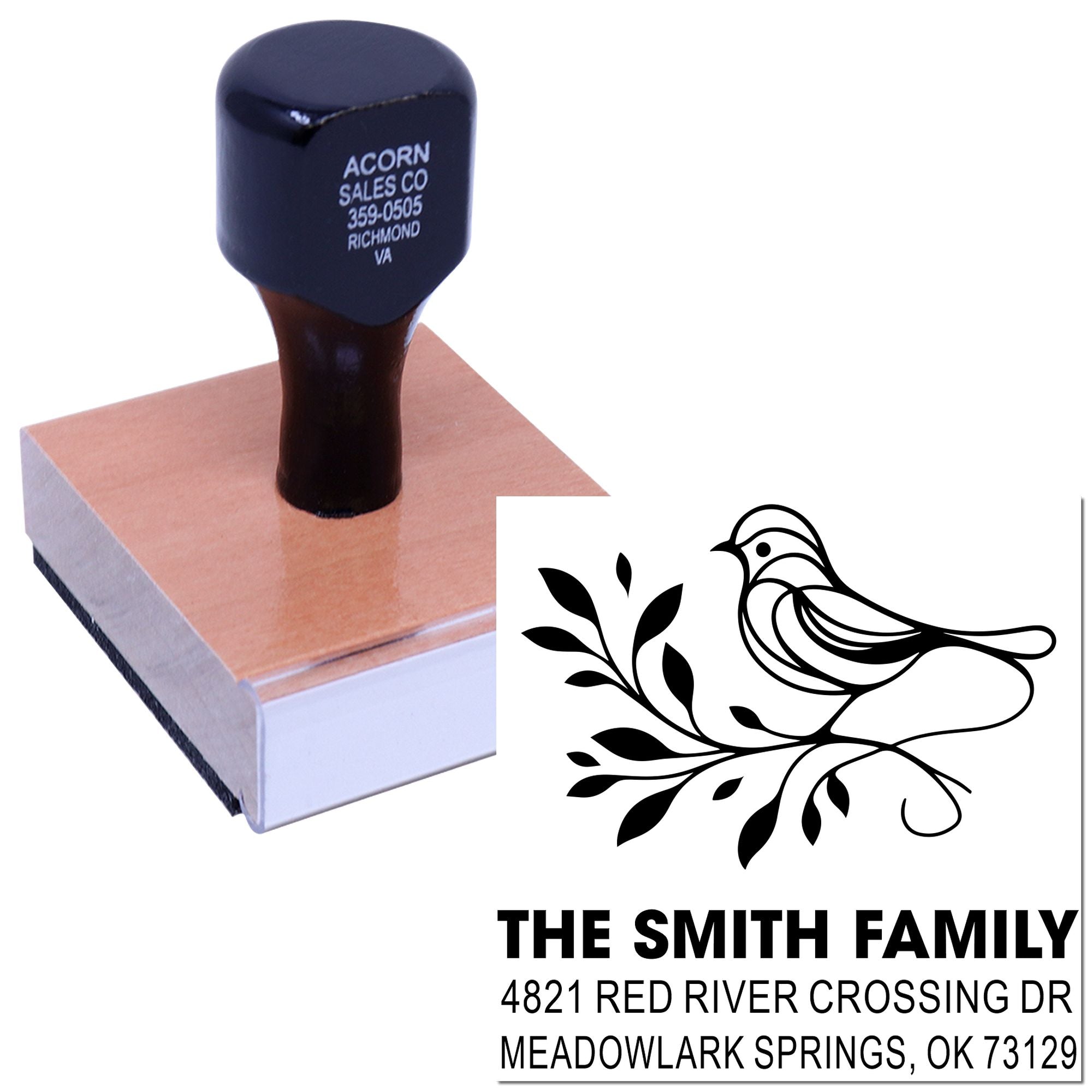 Custom self-inking rubber stamp with bird and leafy branch design, personalized family name and address stamp for envelopes and stationery.