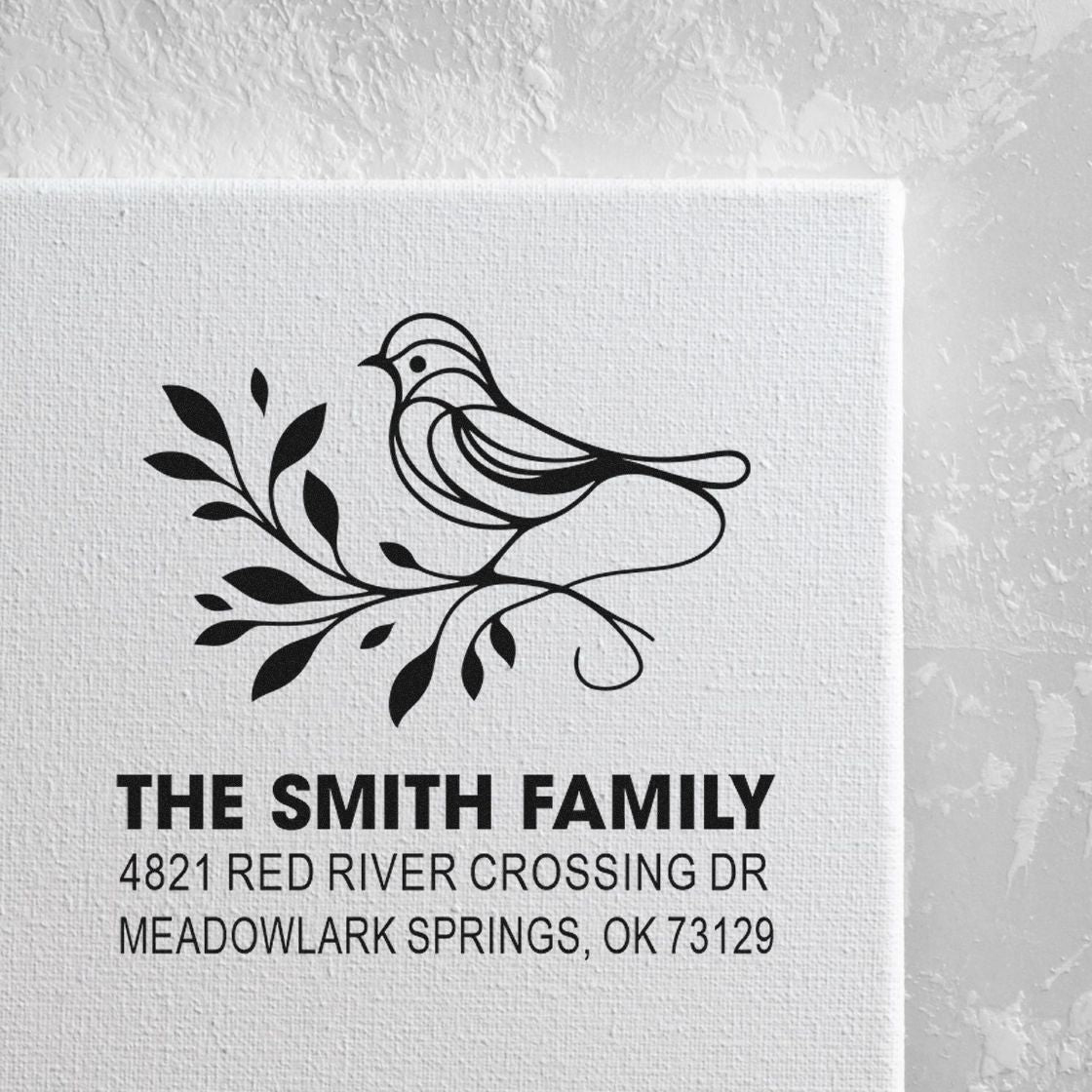 Custom family return address rubber stamp with bird and leafy branch design, featuring The Smith Family name and Meadowlark Springs, OK address.