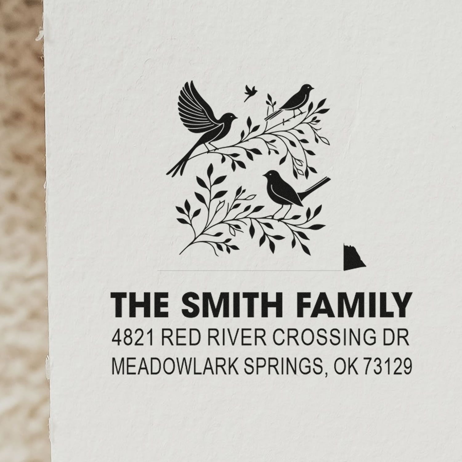 Custom return address rubber stamp with birds on leafy branches, personalized mailing stamp for The Smith Family, Meadowlark Springs OK 73129.