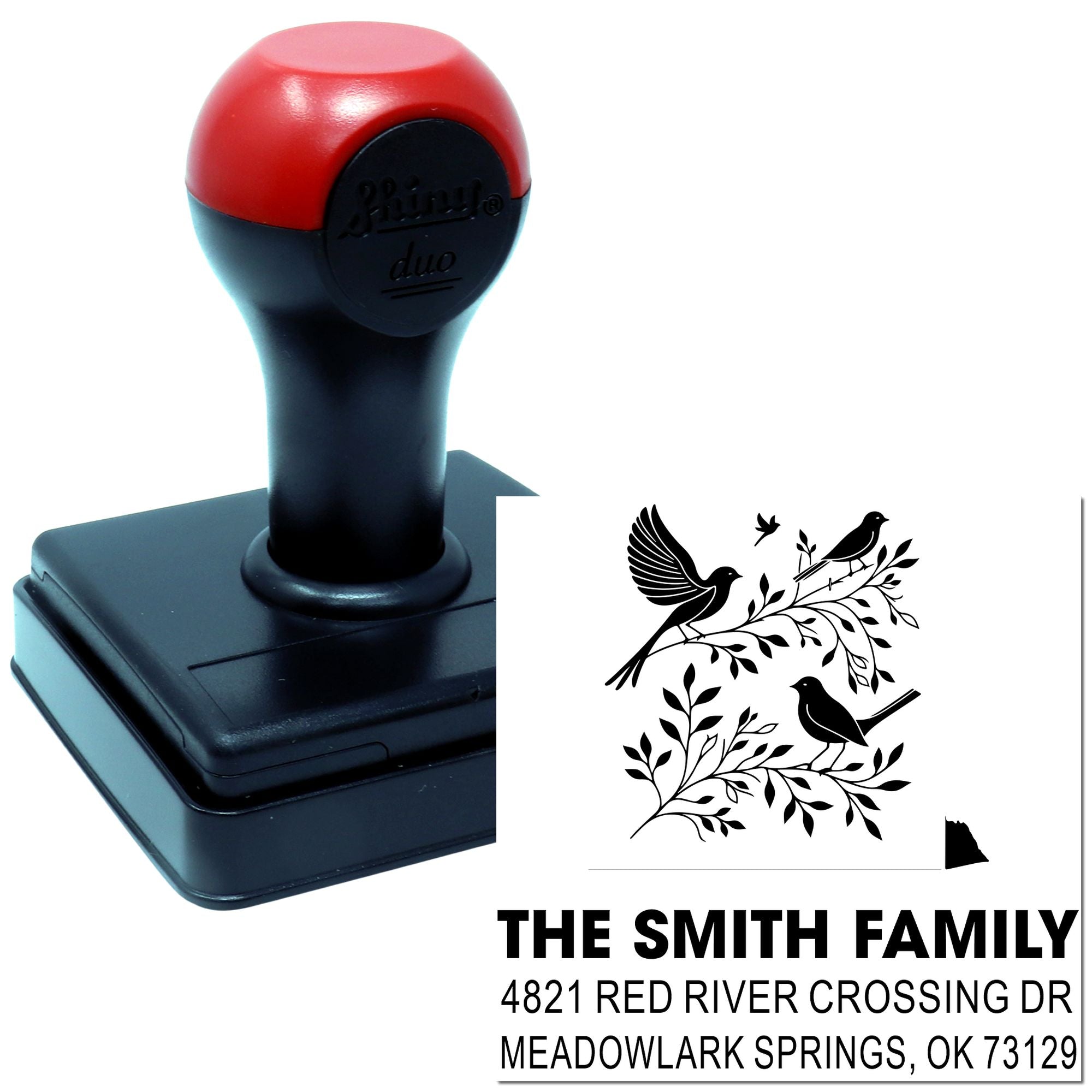 Custom self-inking rubber address stamp with bird branch design for The Smith Family, featuring personalized name and home address in bold print.