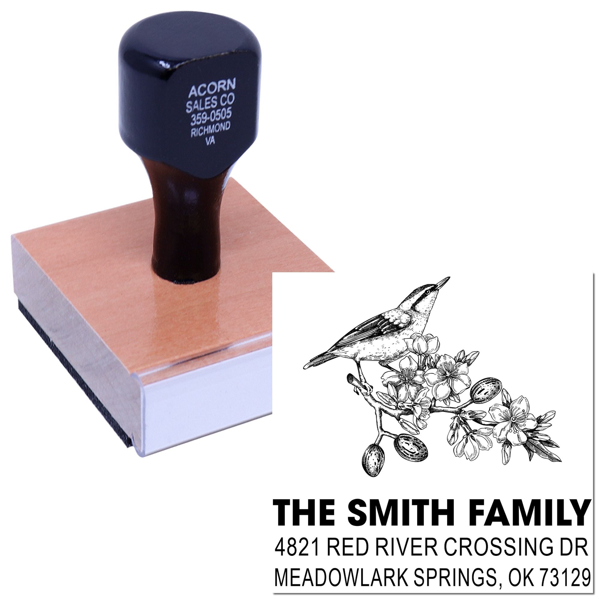 Custom rubber address stamp with bird and floral design, featuring family name and mailing address for personal correspondence and envelope use