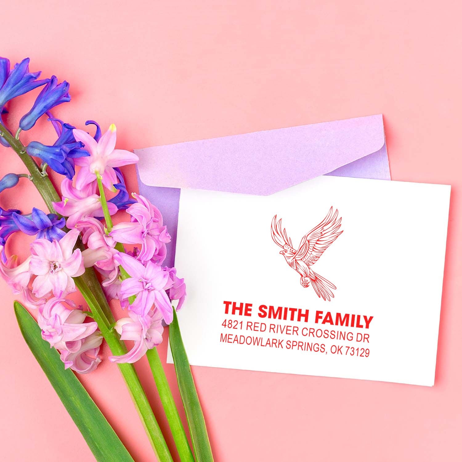 Custom return address rubber stamp for The Smith Family with flying bird logo, perfect for wedding invitations, envelopes, and personalized stationery