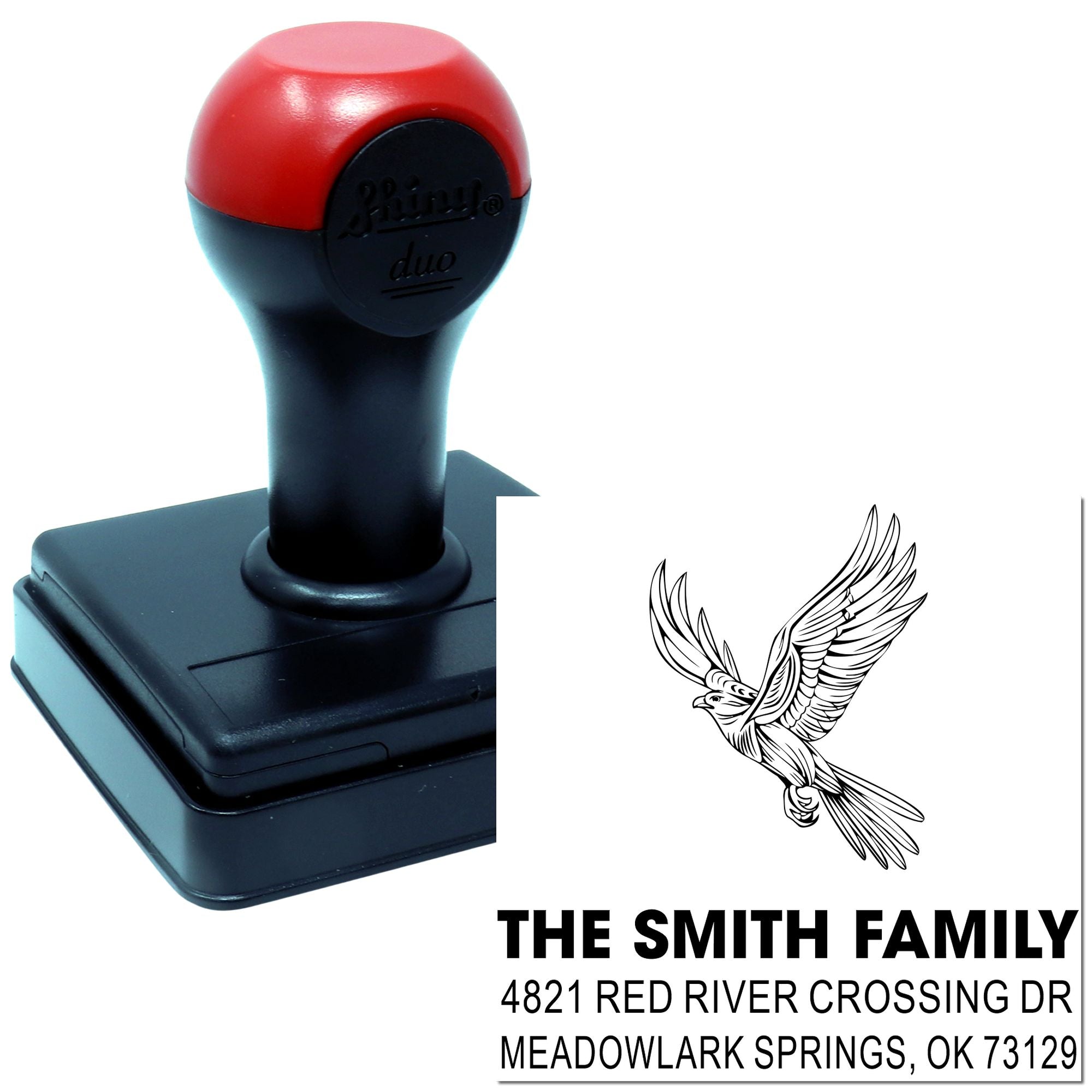 Custom self-inking rubber address stamp with family name, bird graphic, and return address for personalized mailing and home correspondence.