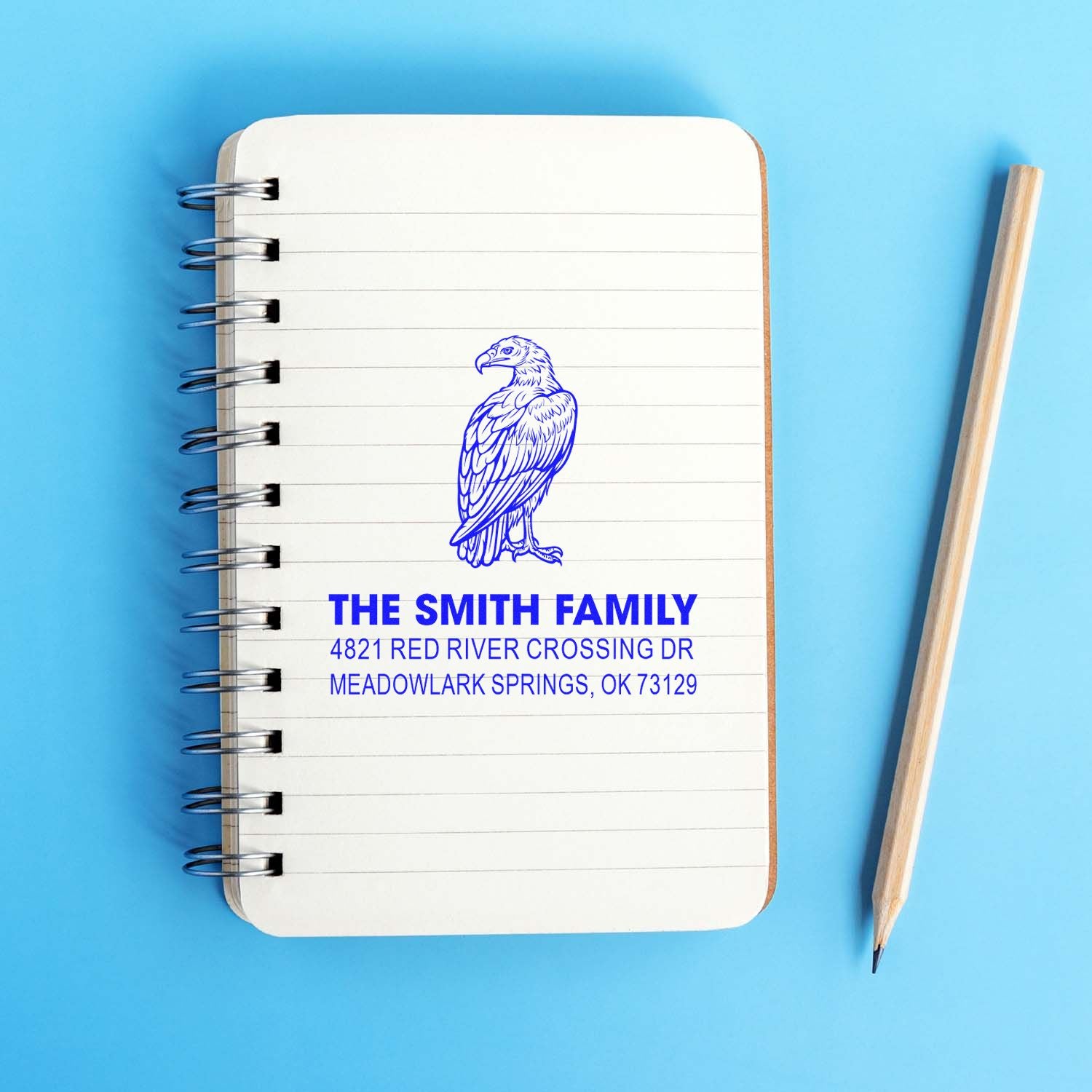 Custom return address rubber stamp with eagle design, personalized family name and mailing address, ideal for notebooks, stationery, and business mailings