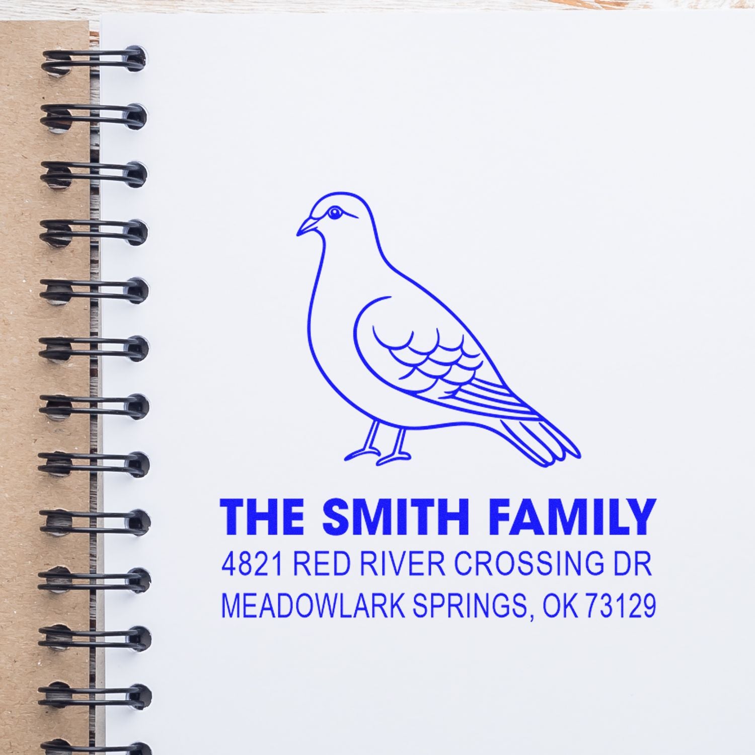 Custom family return address rubber stamp with pigeon illustration, The Smith Family, 4821 Red River Crossing Dr, Meadowlark Springs OK 73129.