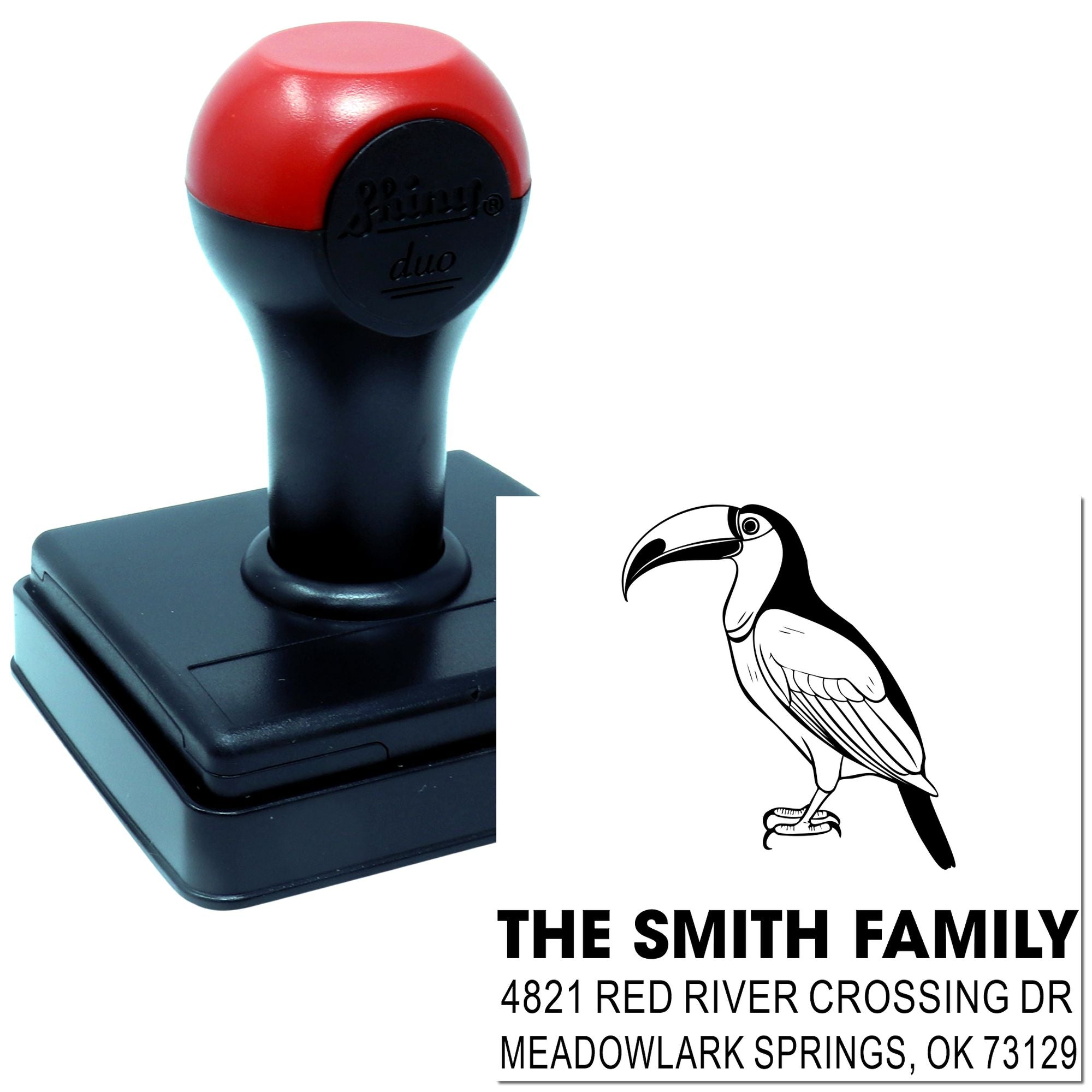Custom self-inking rubber stamp with toucan design and family address imprint, ideal for personalized mailing, return address, and craft use