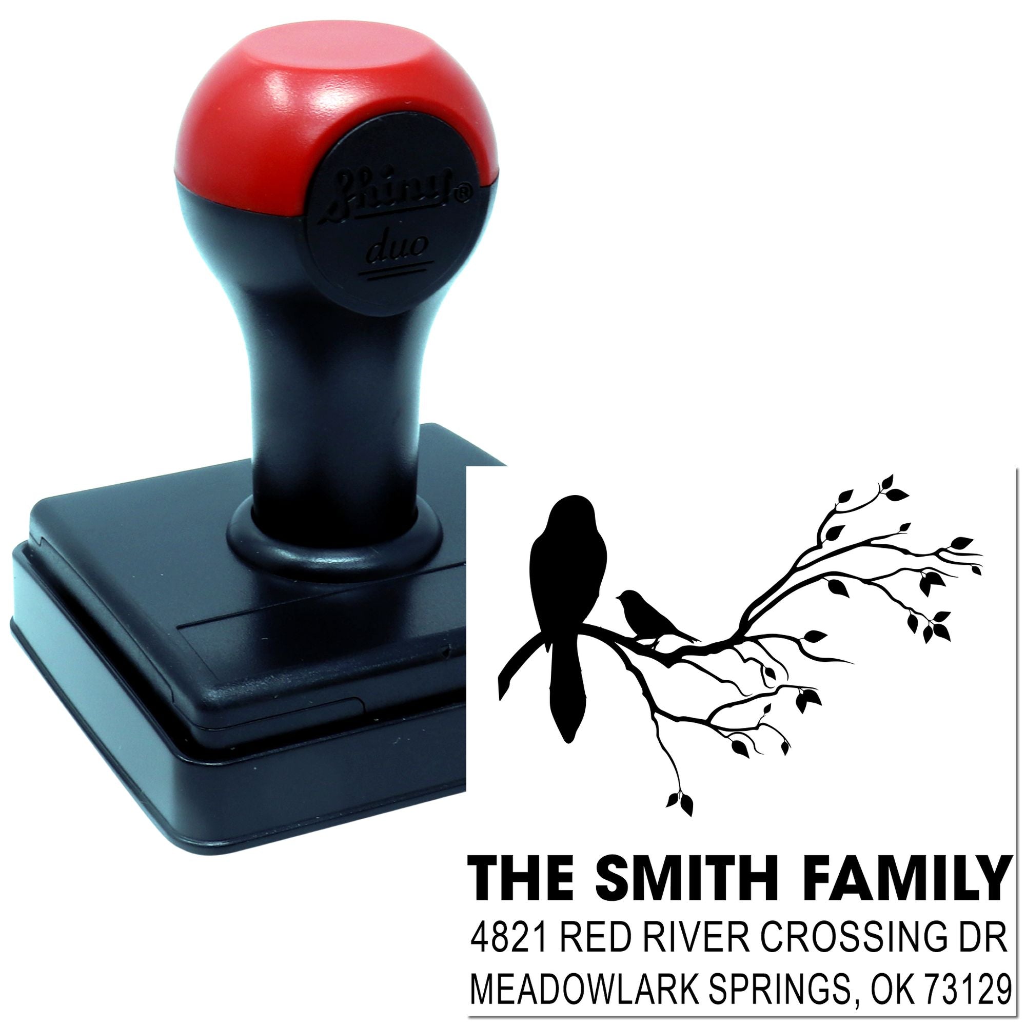Custom self-inking rubber stamp with red and black handle, bird branch design, and personalized Smith family return address for envelopes.