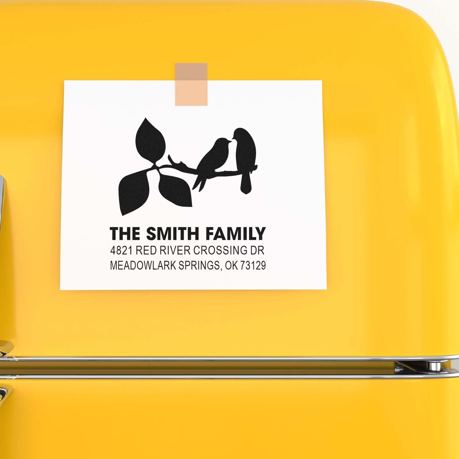 Personalized custom rubber stamp with bird and leaf design, featuring The Smith Family name and Meadowlark Springs, OK return address for mailing.