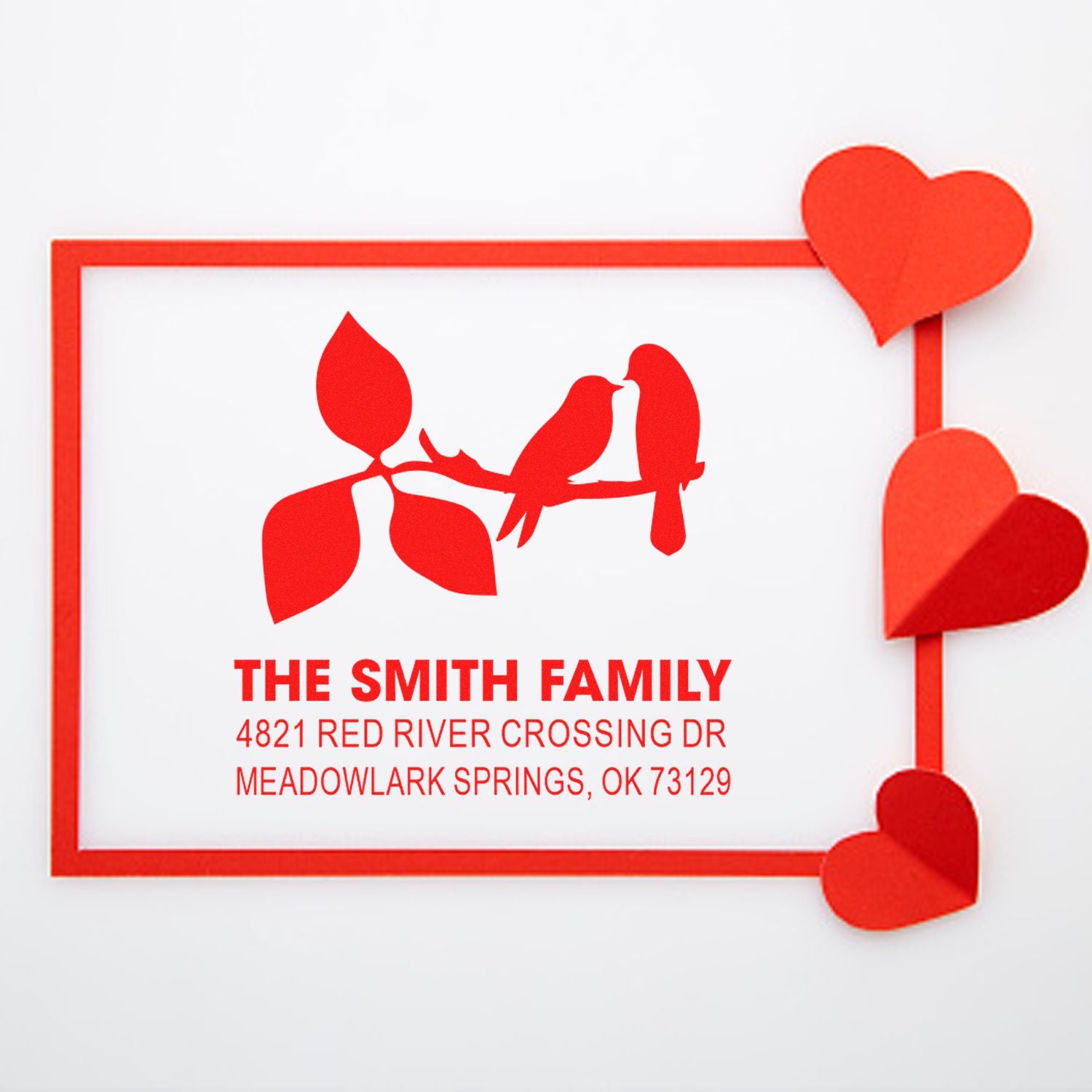 Personalized family return address rubber stamp with birds on a branch, red heart border accents, and The Smith Family Meadowlark Springs, OK address