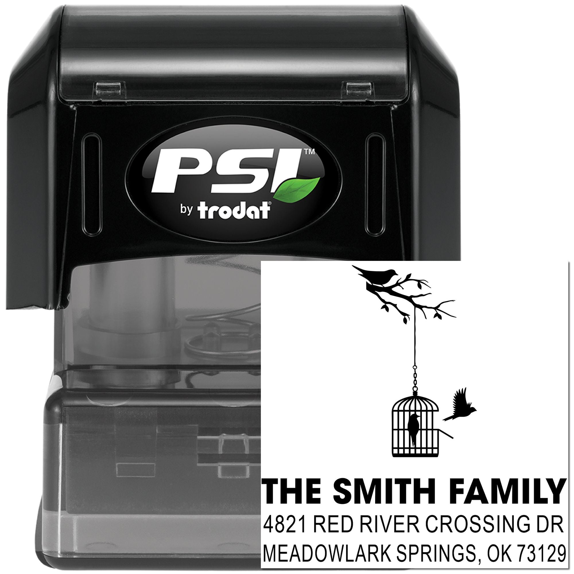 Custom self-inking address stamp with birdcage and branch design, featuring The Smith Family name and full mailing address for envelopes