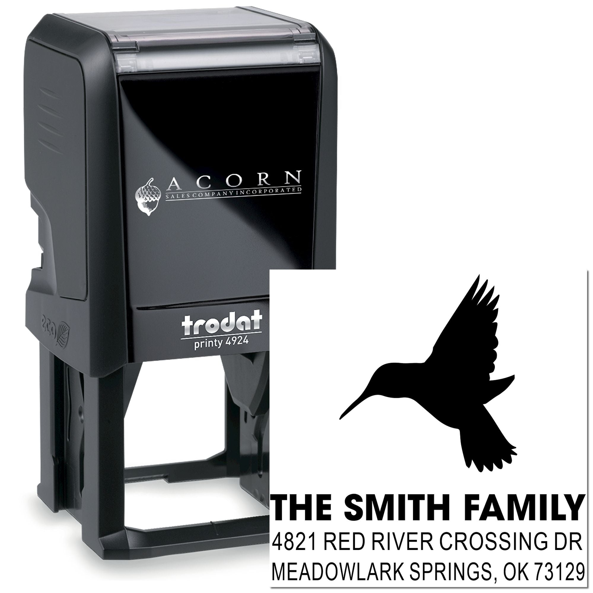 Custom self-inking Trodat Printy 4924 rubber stamp with hummingbird design, family name, and return address for personalized mailing and correspondence