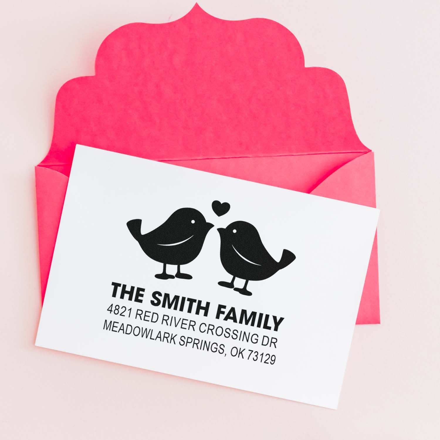 Custom bird return address rubber stamp with pink envelope, black love birds, and personalized Smith family mailing address for stationery and mail