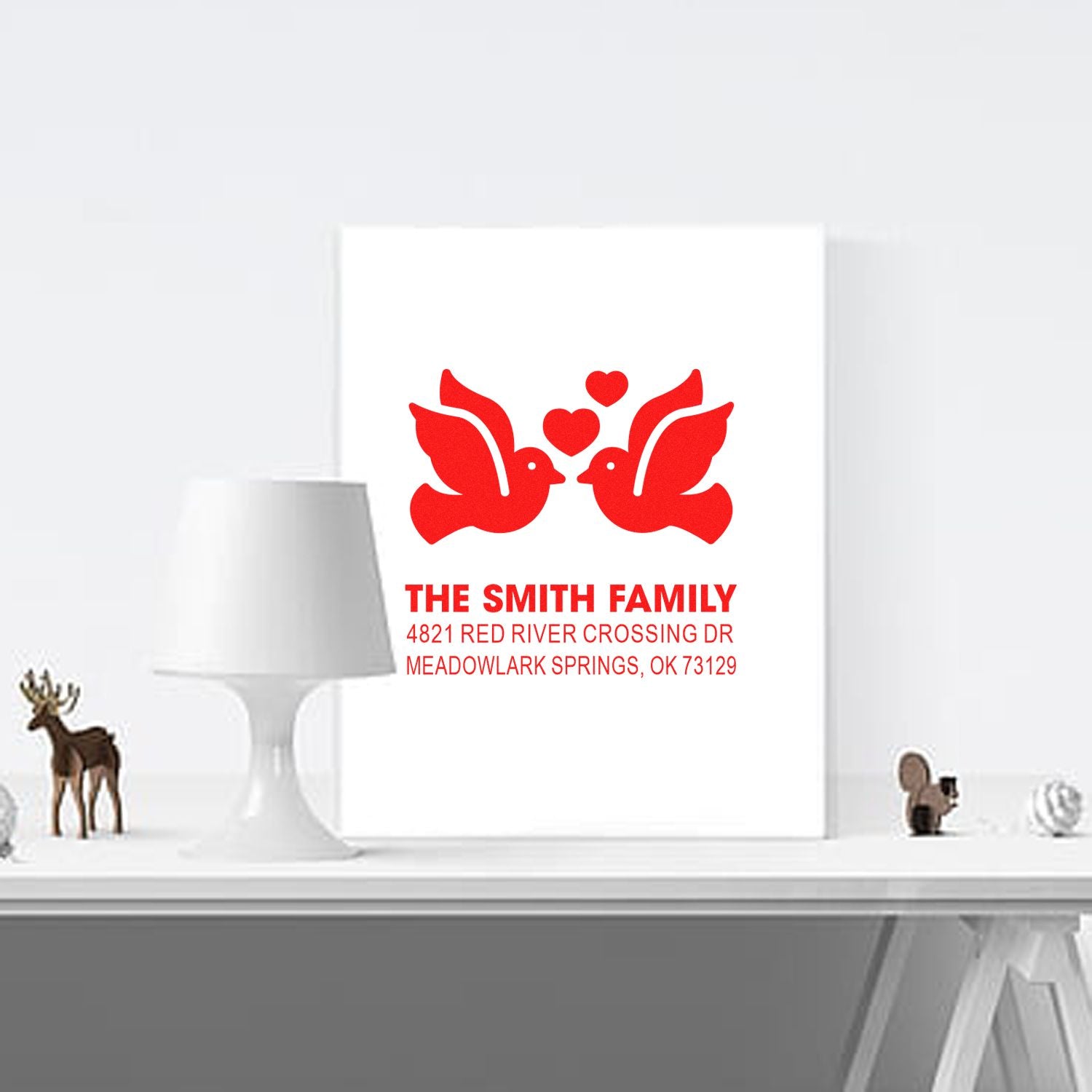 Custom return address rubber stamp with red doves and hearts, featuring The Smith Family name and address for personalized wedding stationery