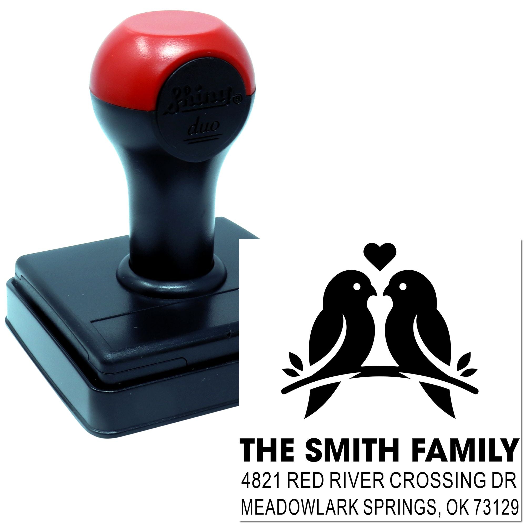 Custom self-inking rubber address stamp with twin birds design, The Smith Family name and Meadowlark Springs OK return address for envelopes.
