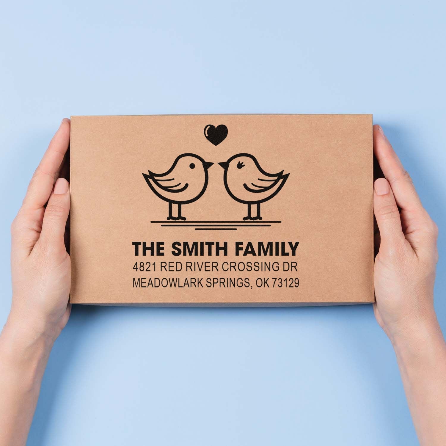 Custom rubber address stamp with two birds and heart design, personalized family name and return address for wedding or housewarming packaging