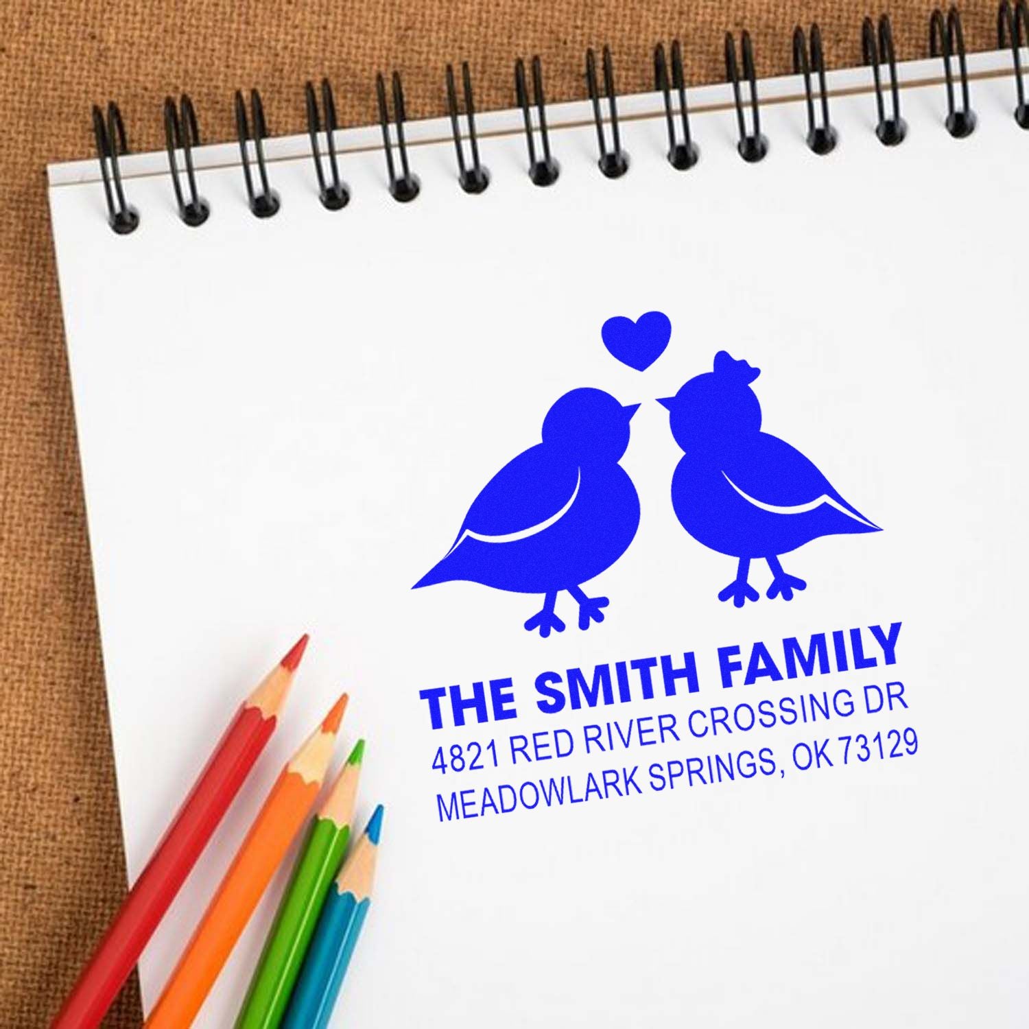 Custom rubber stamp with two blue birds and heart, featuring The Smith Family name and address for personalized stationery, envelopes, and crafts.