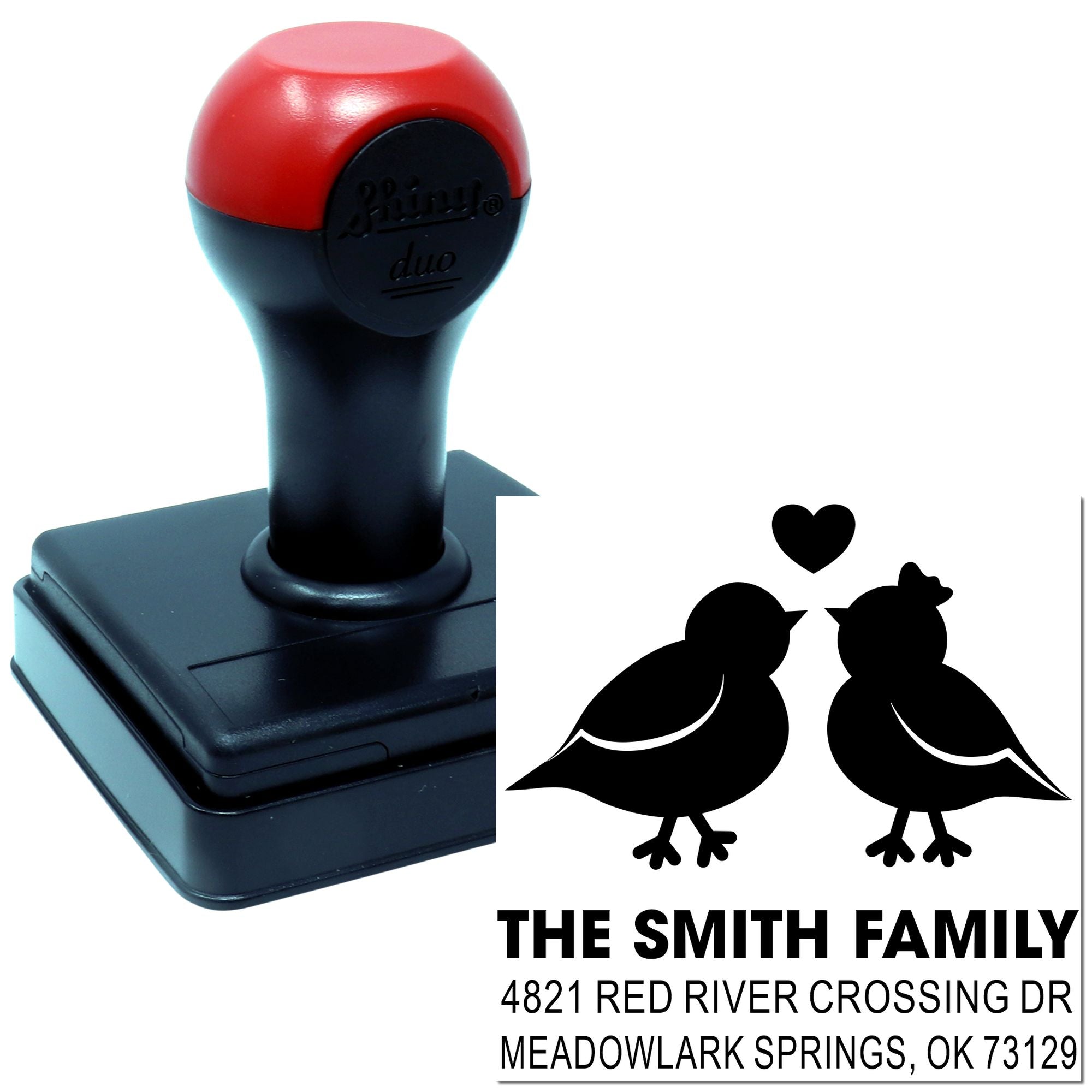 Custom self-inking rubber stamp with bird couple design and family address, featuring black base and red handle for personalized mailings.