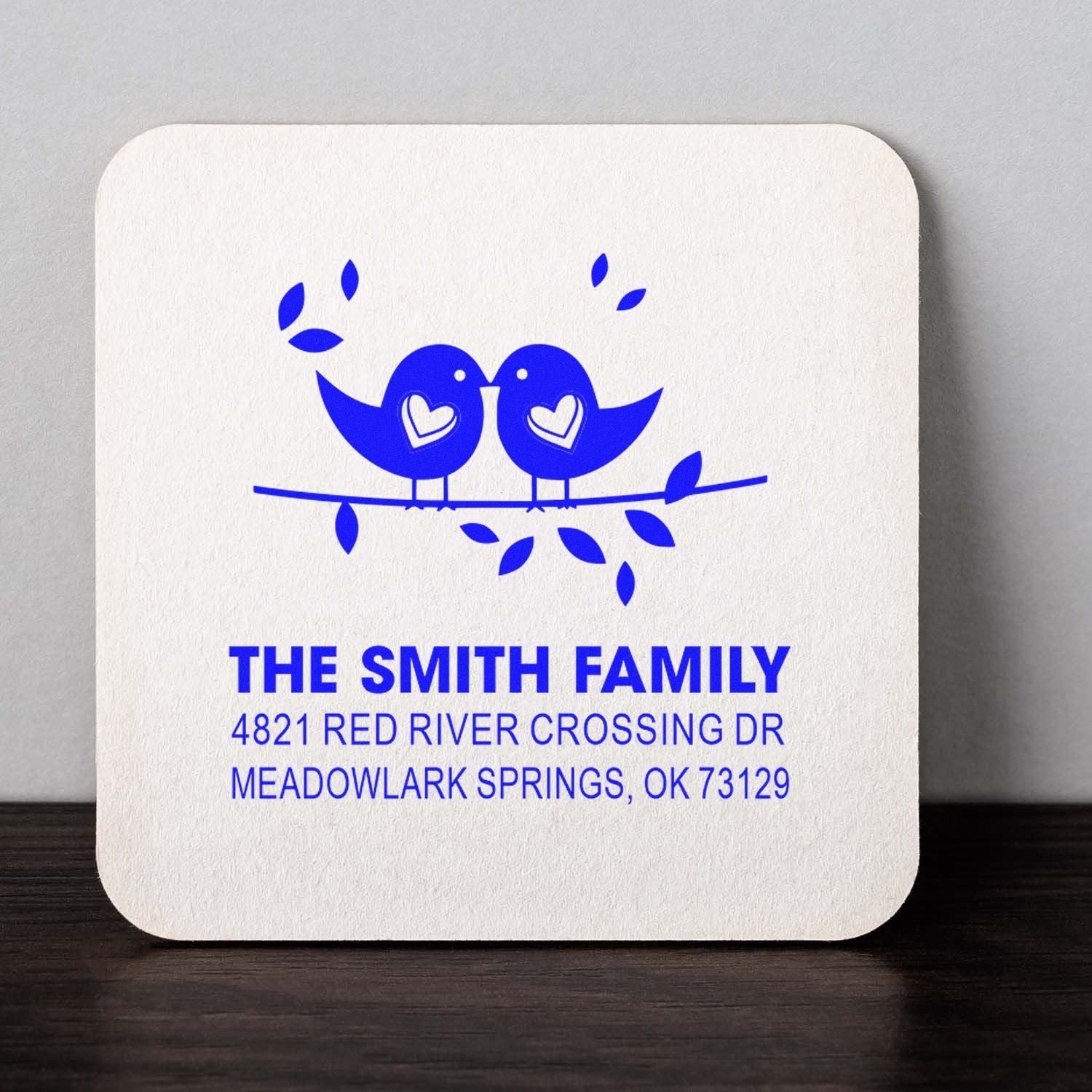 Custom rubber address stamp with two love birds on a branch, personalized family name and return address for wedding, shower, or housewarming.