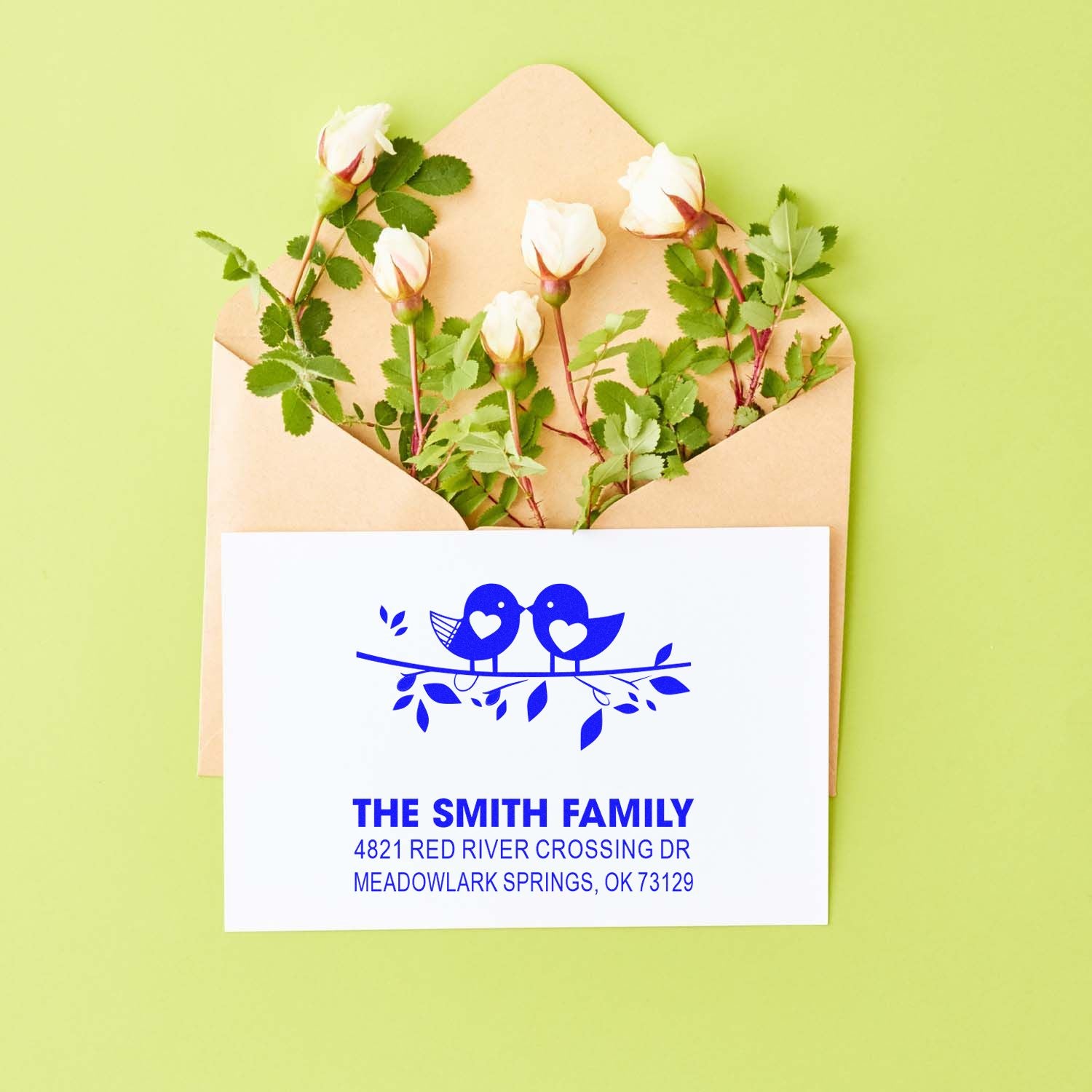 Custom return address rubber stamp with blue bird design on envelope, personalized Smith Family mailing label for wedding and home correspondence.