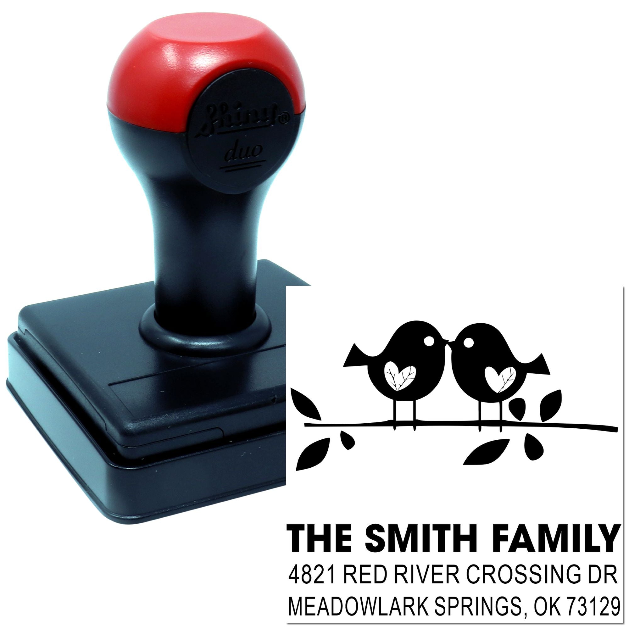 Custom self-inking rubber stamp with red and black handle, featuring bird branch artwork and personalized Smith family return address design for mailing use