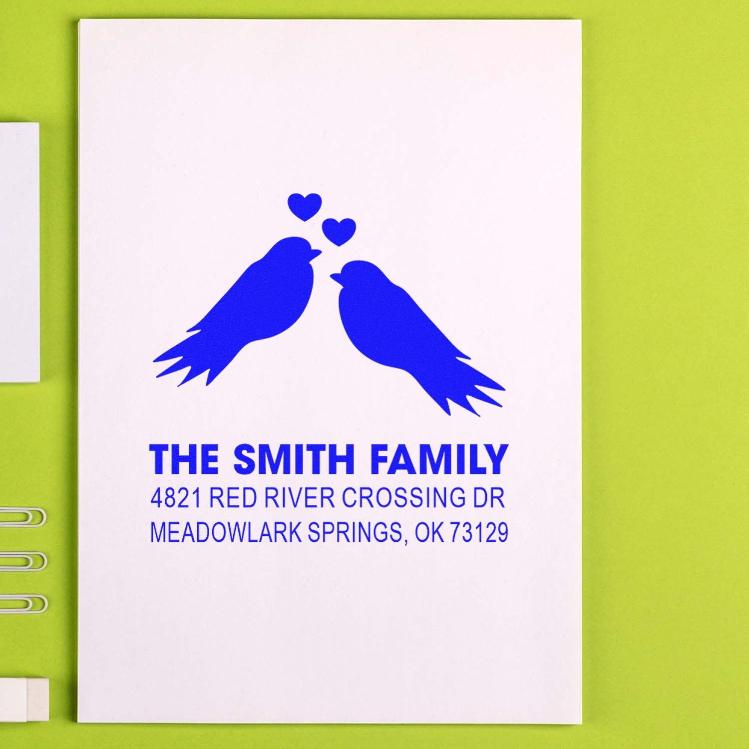 Custom family address rubber stamp with two blue birds and hearts, featuring The Smith Family name and mailing address for return envelopes
