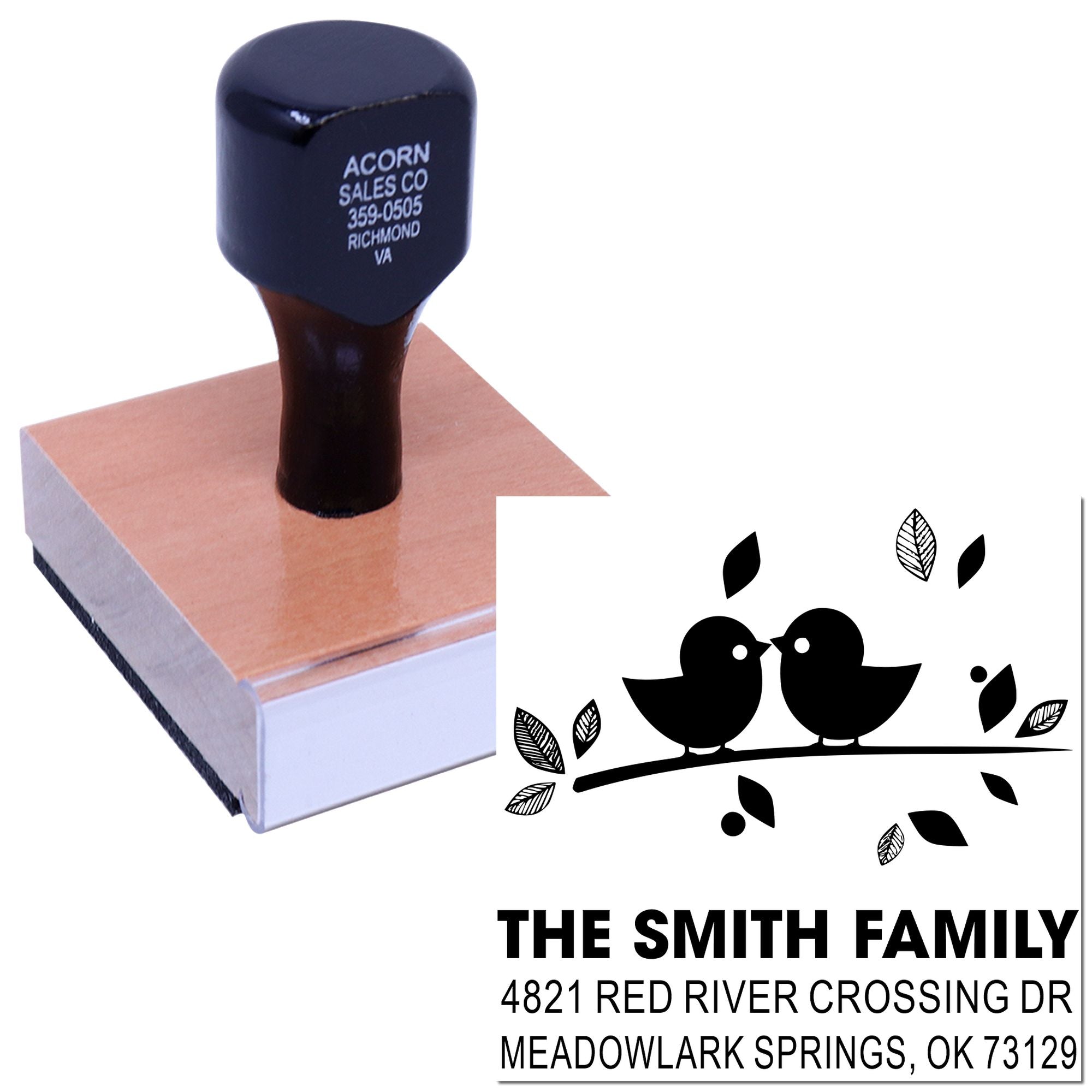 Custom rubber address stamp with bird design, family name, and return address, featuring a wooden handle stamp impression for envelopes.