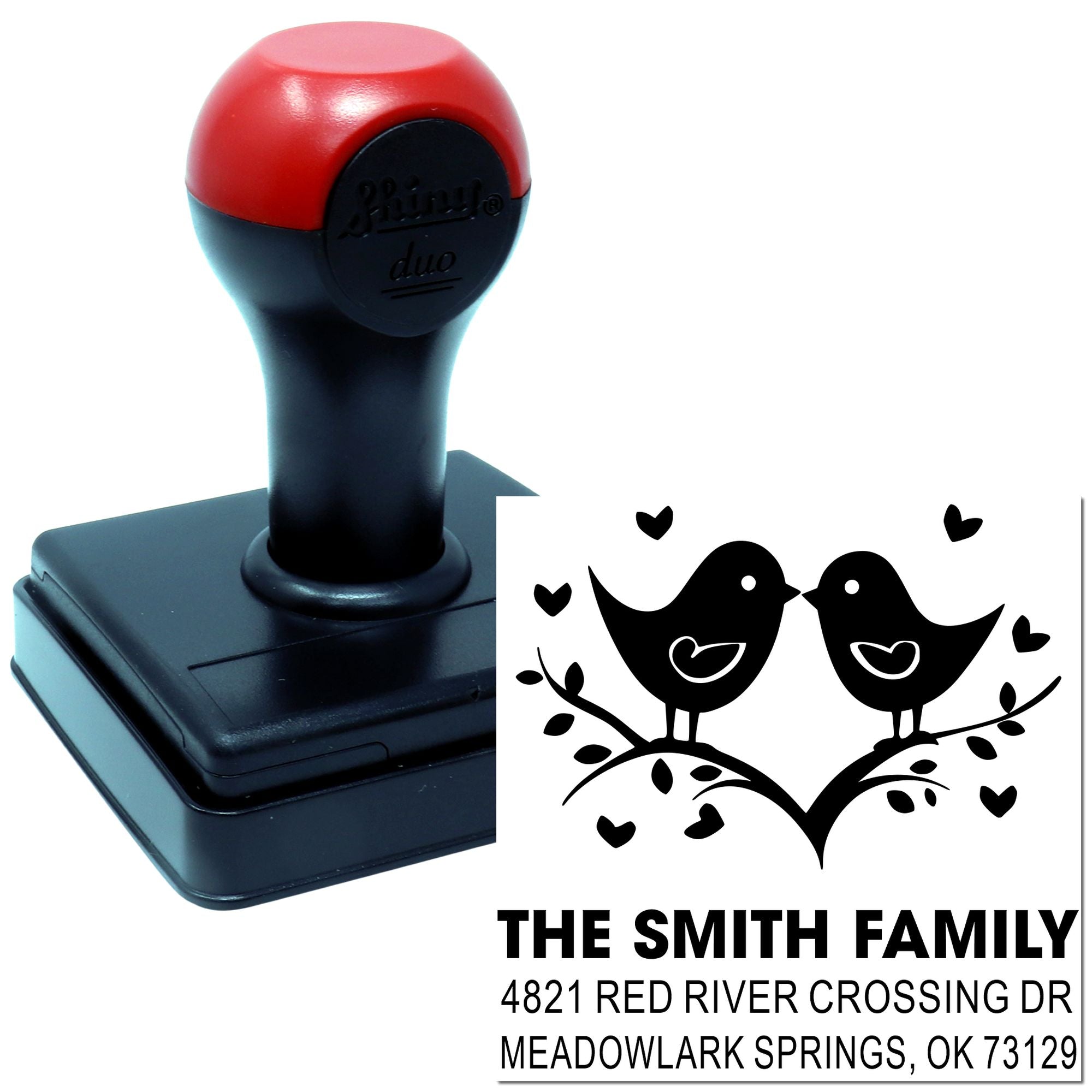 Custom self-inking rubber address stamp with two birds and heart design, personalized family name and return address for envelopes and mail.