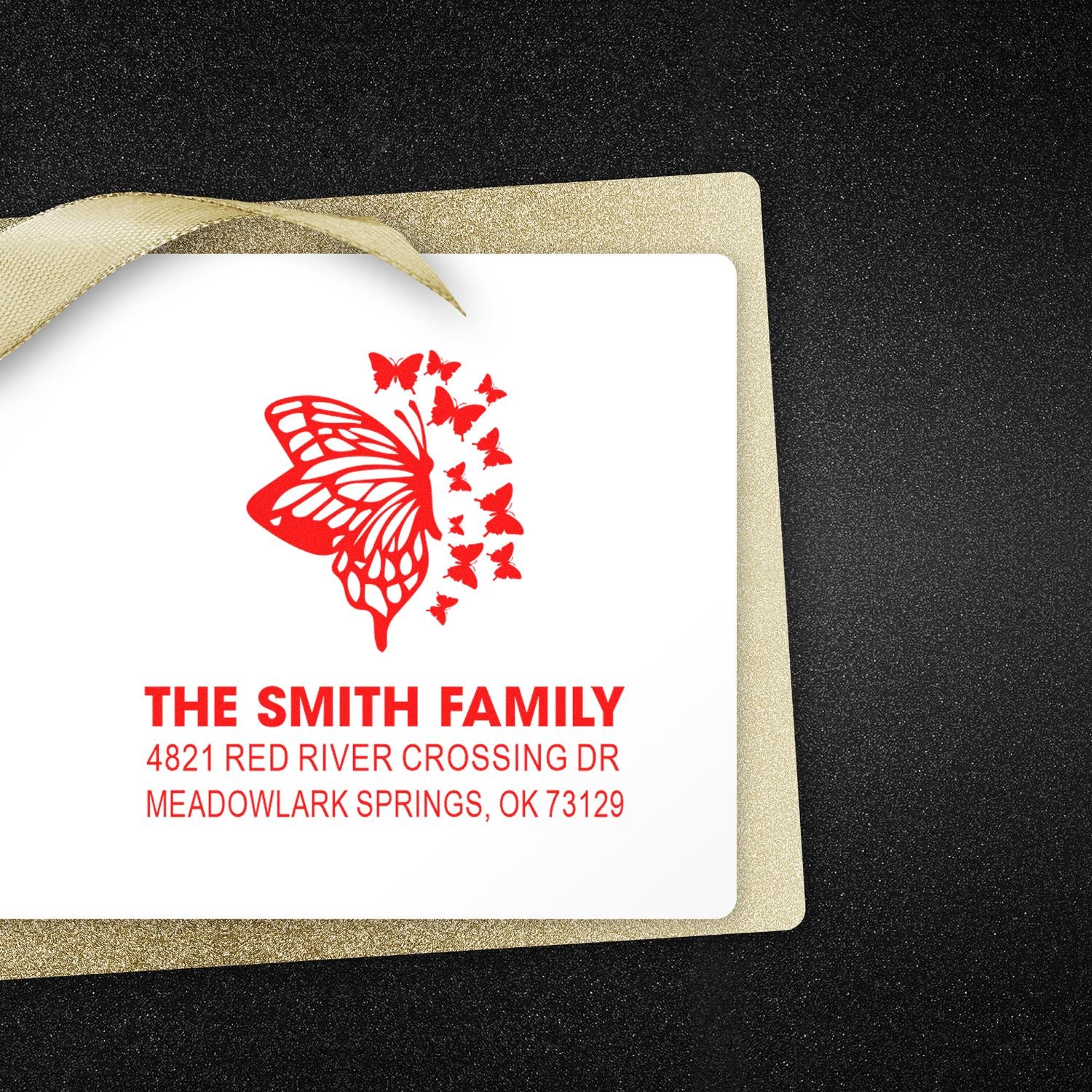 Custom butterfly family address rubber stamp with red butterfly design and personalized return address for Smith family in Meadowlark Springs, OK