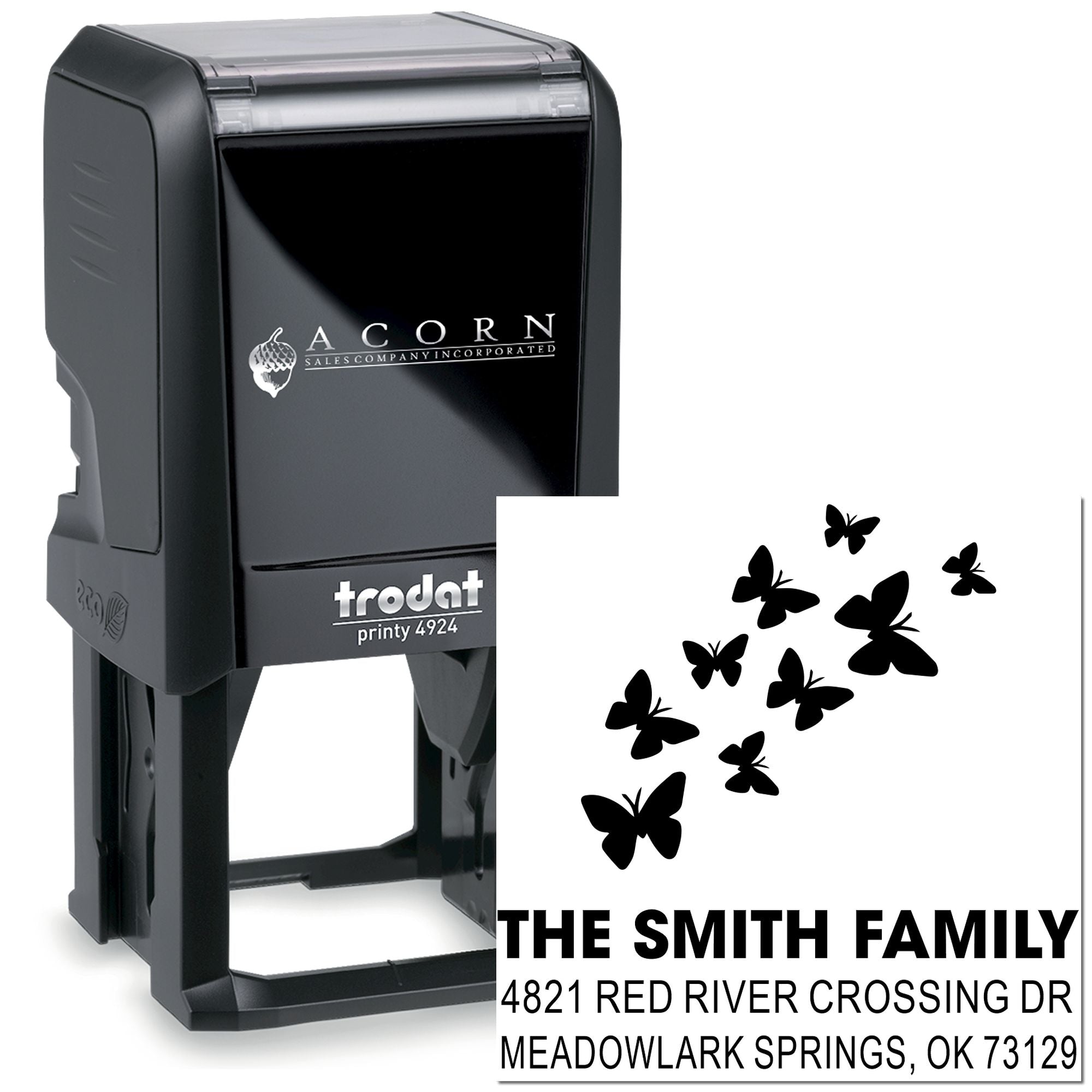 Custom self-inking rubber address stamp with butterfly design, The Smith Family name, and return address on a black Trodat Printy 4924 stamp