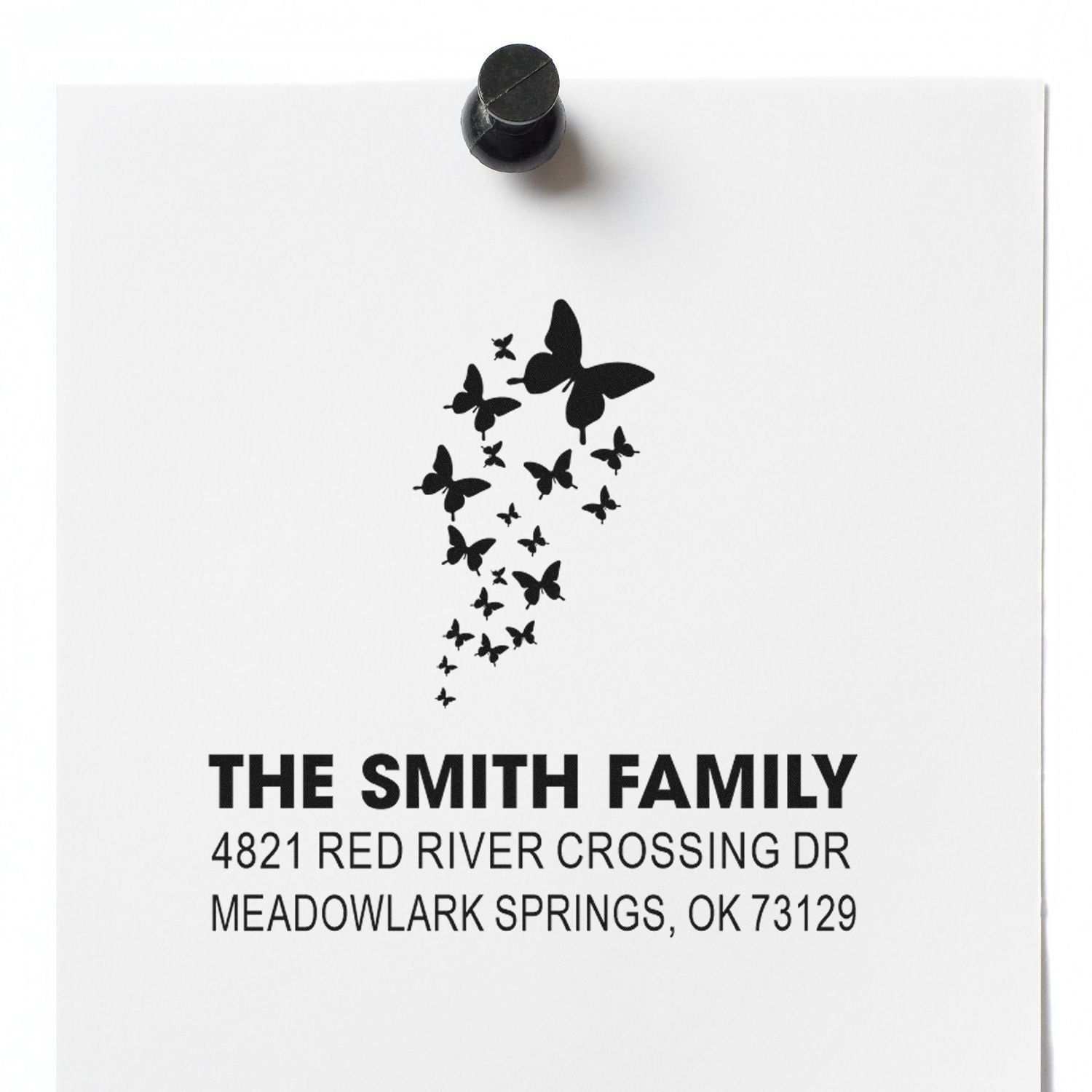 Custom butterfly return address rubber stamp for The Smith Family, featuring personalized name and Meadowlark Springs, OK address for envelopes.