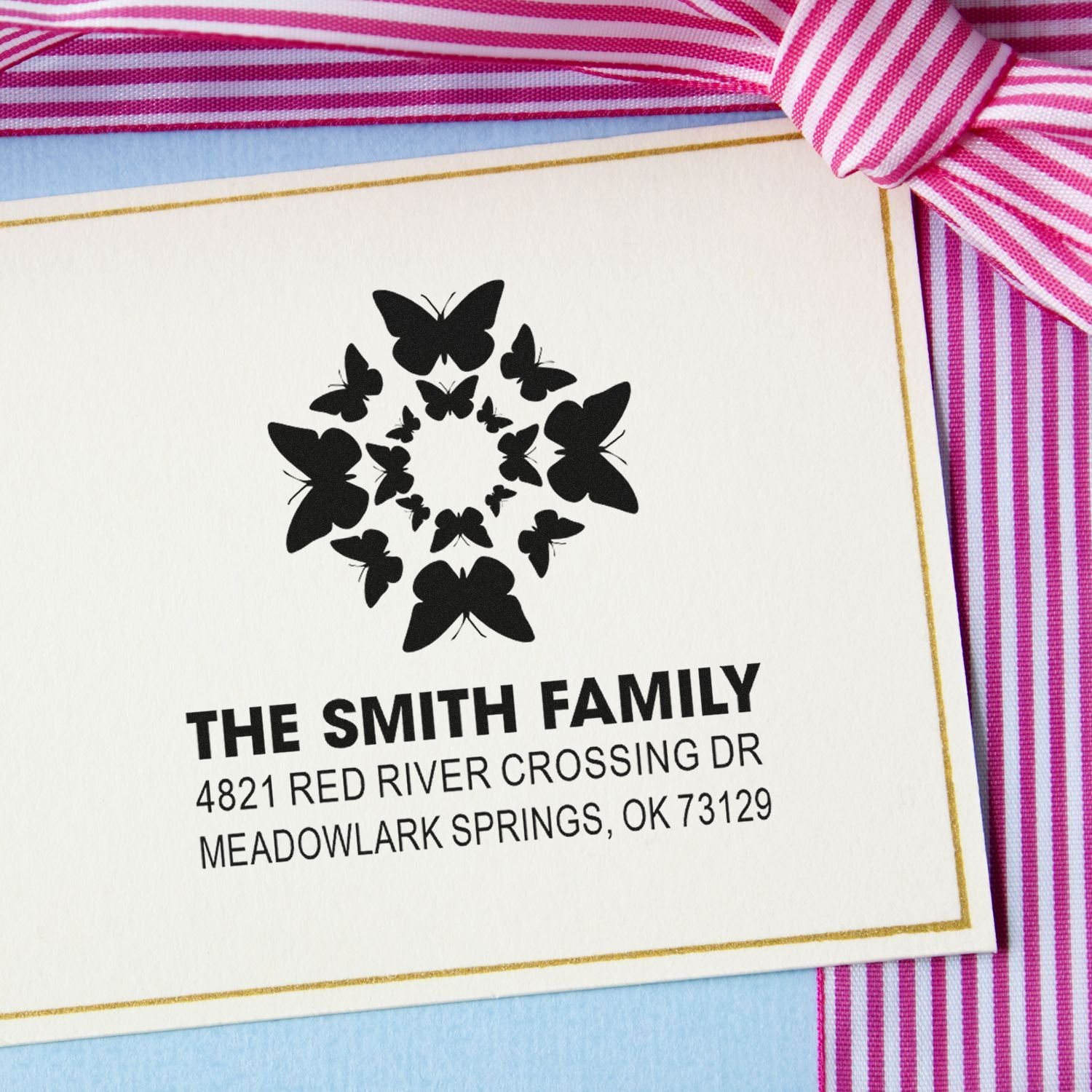 Custom butterfly family return address rubber stamp with name, street address, city, state, and ZIP for personalized mail and stationery