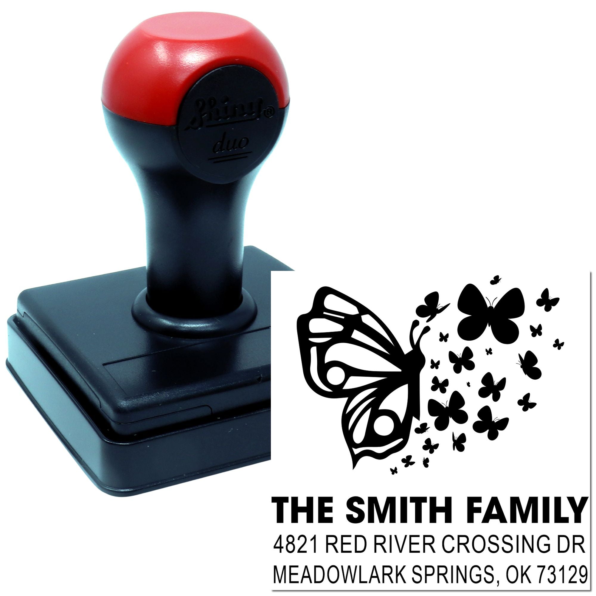 Custom self-inking rubber address stamp with butterfly family design, personalized name and mailing address, ideal for home and wedding use.