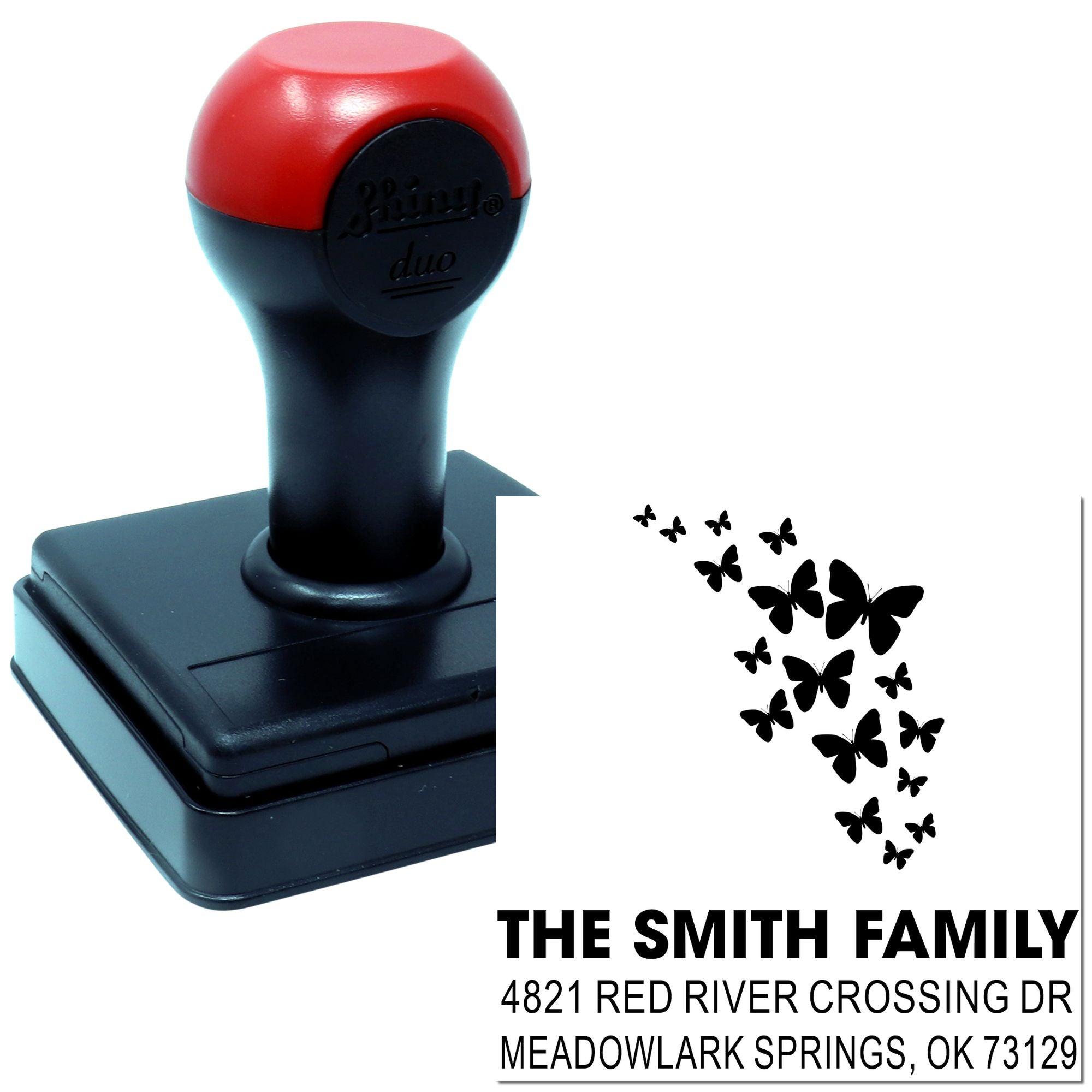 Custom self-inking rubber address stamp with butterfly design, The Smith Family name, and Meadowlark Springs OK return address