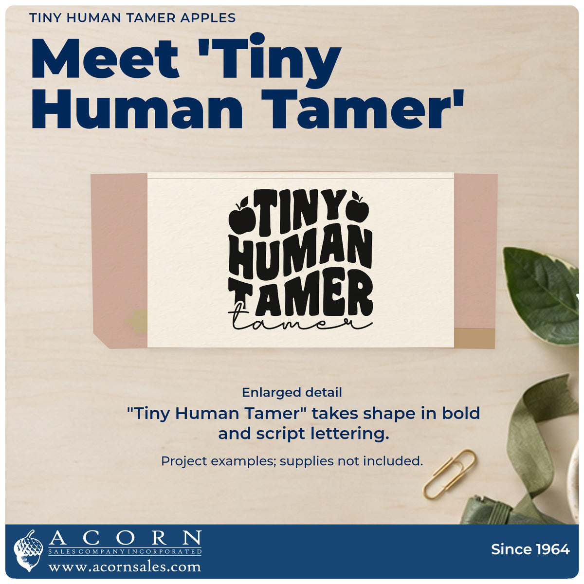 Enlarged detail of the Tiny Human Tamer Apples Self-Inking Stamp imprint. “Tiny Human Tamer” appears in bold lettering with apples and an additional script “Tamer.”