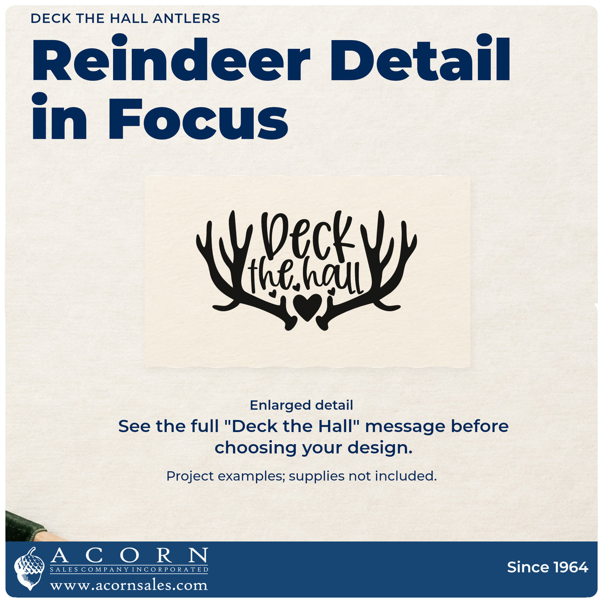 Enlarged detail of the Deck The Hall Antlers Compact Pre-Inked Stamp – Slim imprint. “Deck the Hall” sits between large antlers with a heart at the base.