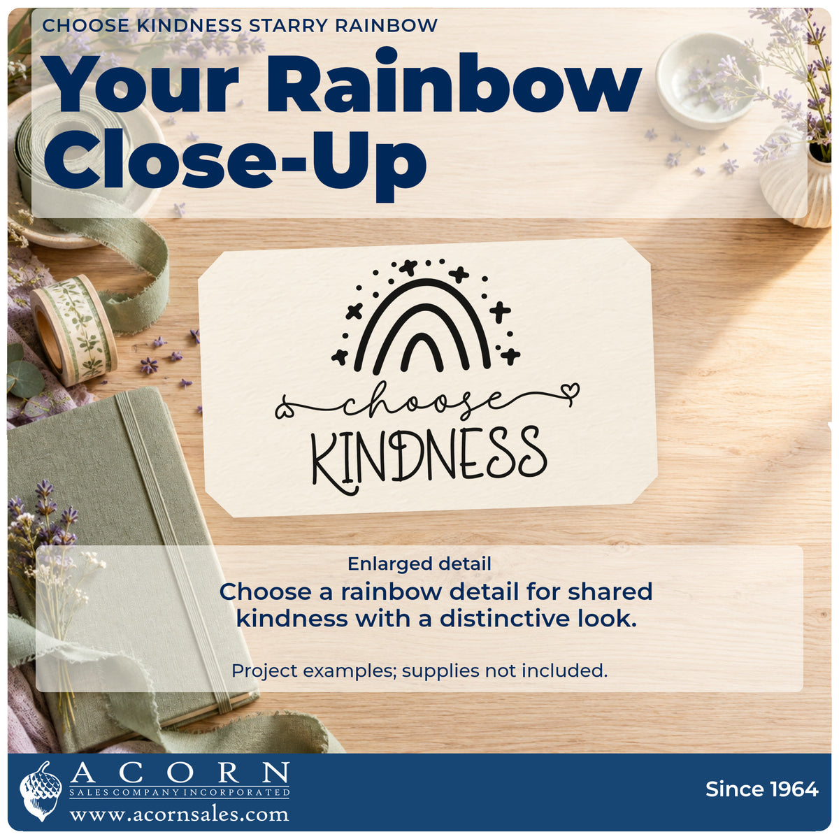 Enlarged detail of the Choose Kindness Starry Rainbow Self-Inking Stamp imprint. A rainbow surrounded by tiny sparkles sits above "choose kindness" with heart-ended flourishes.