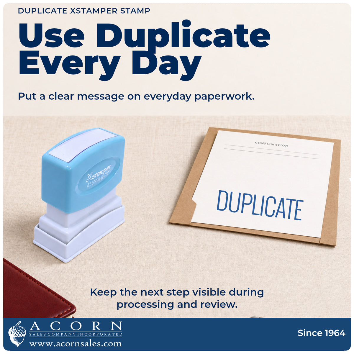 Duplicate Stamp being pressed to leave an imprint reading "Duplicate"