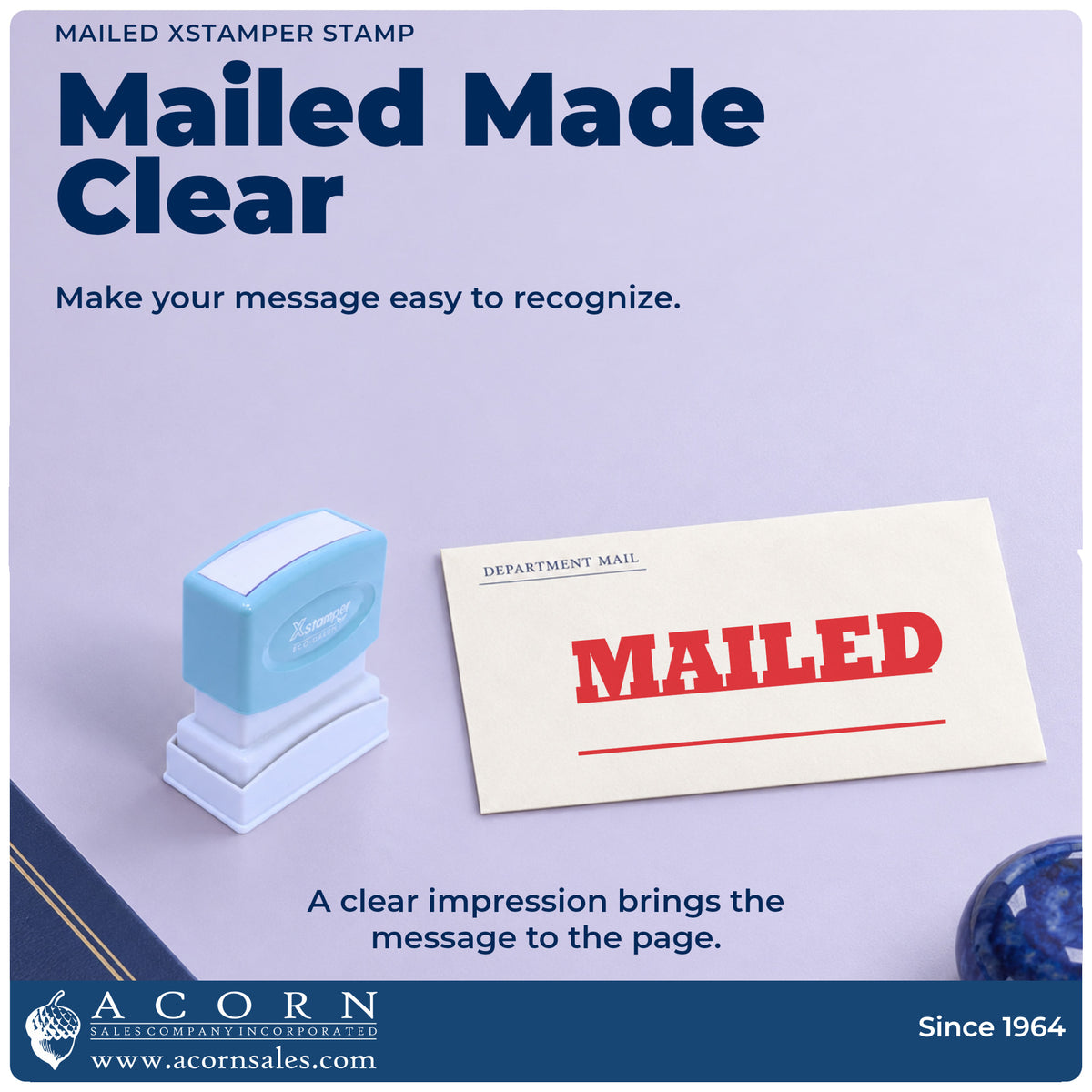 "Mailed" imprint on office paperwork beside the Mailed Stamp For Mail Processing