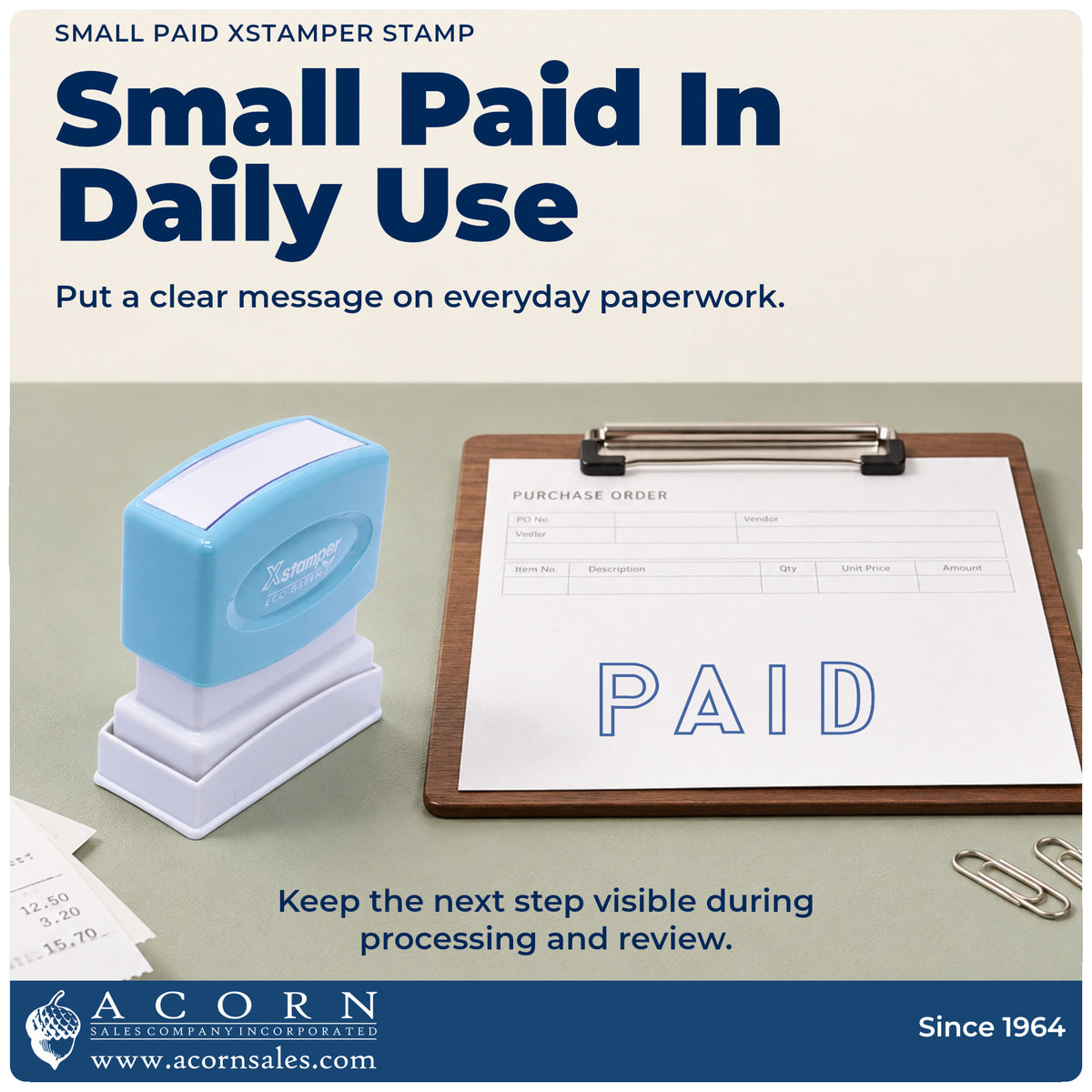 Small Paid Stamp being pressed to leave an imprint reading "Paid"