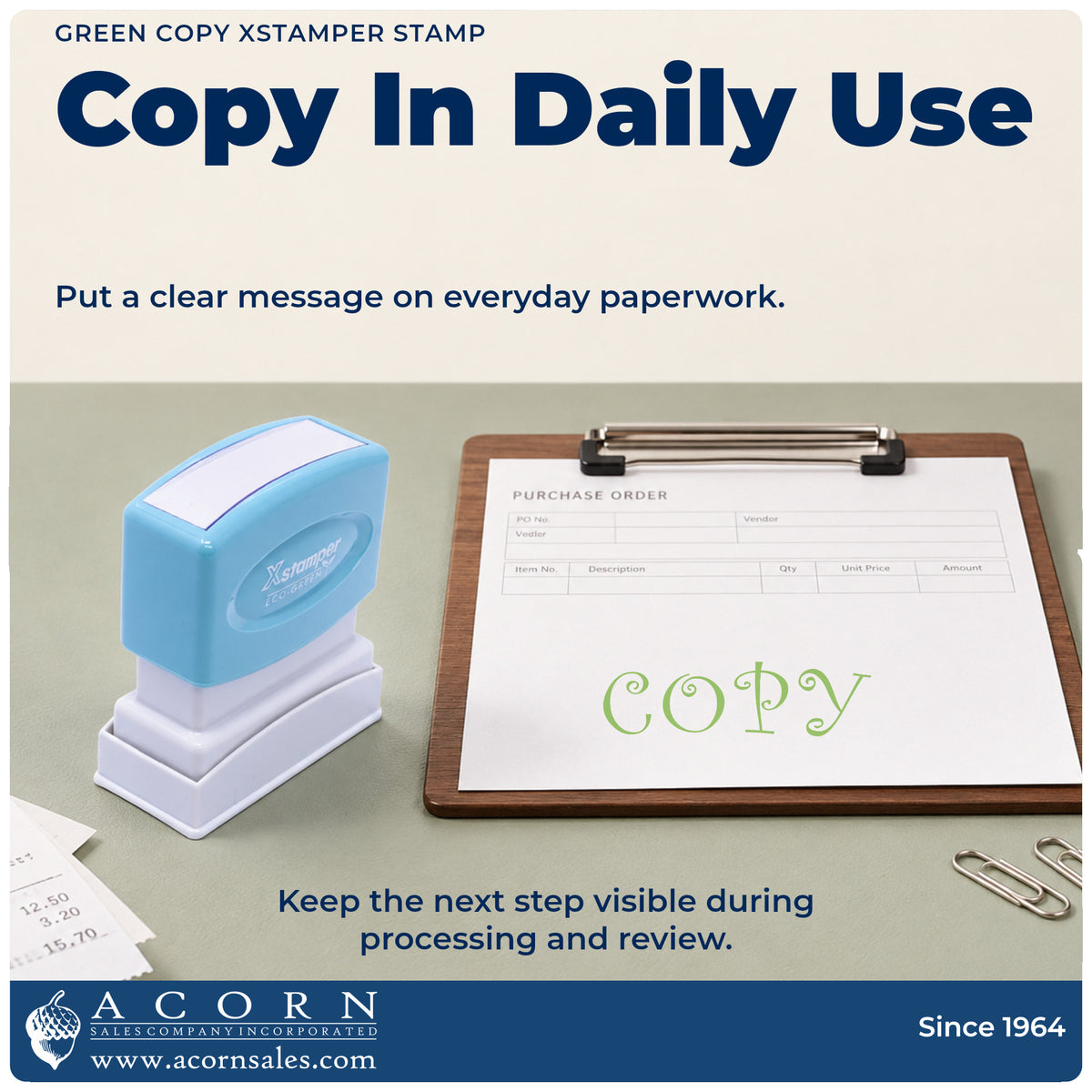 Green Copy Stamp being pressed to leave an imprint reading "Copy"