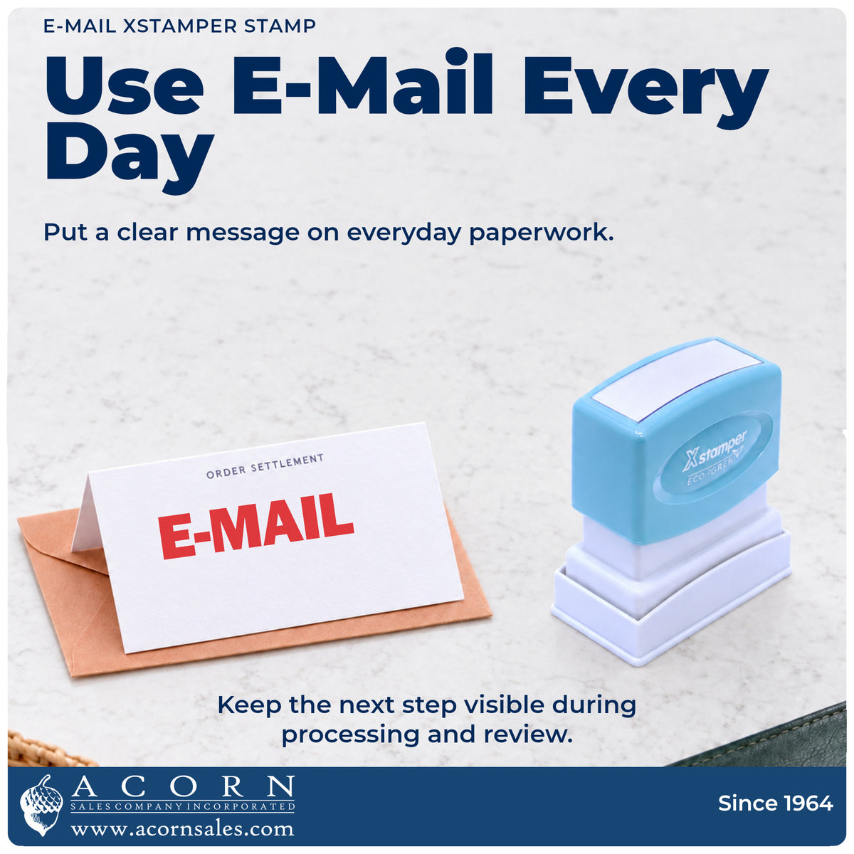 E-Mail Office Stamp being pressed to leave an imprint reading "E-mail"
